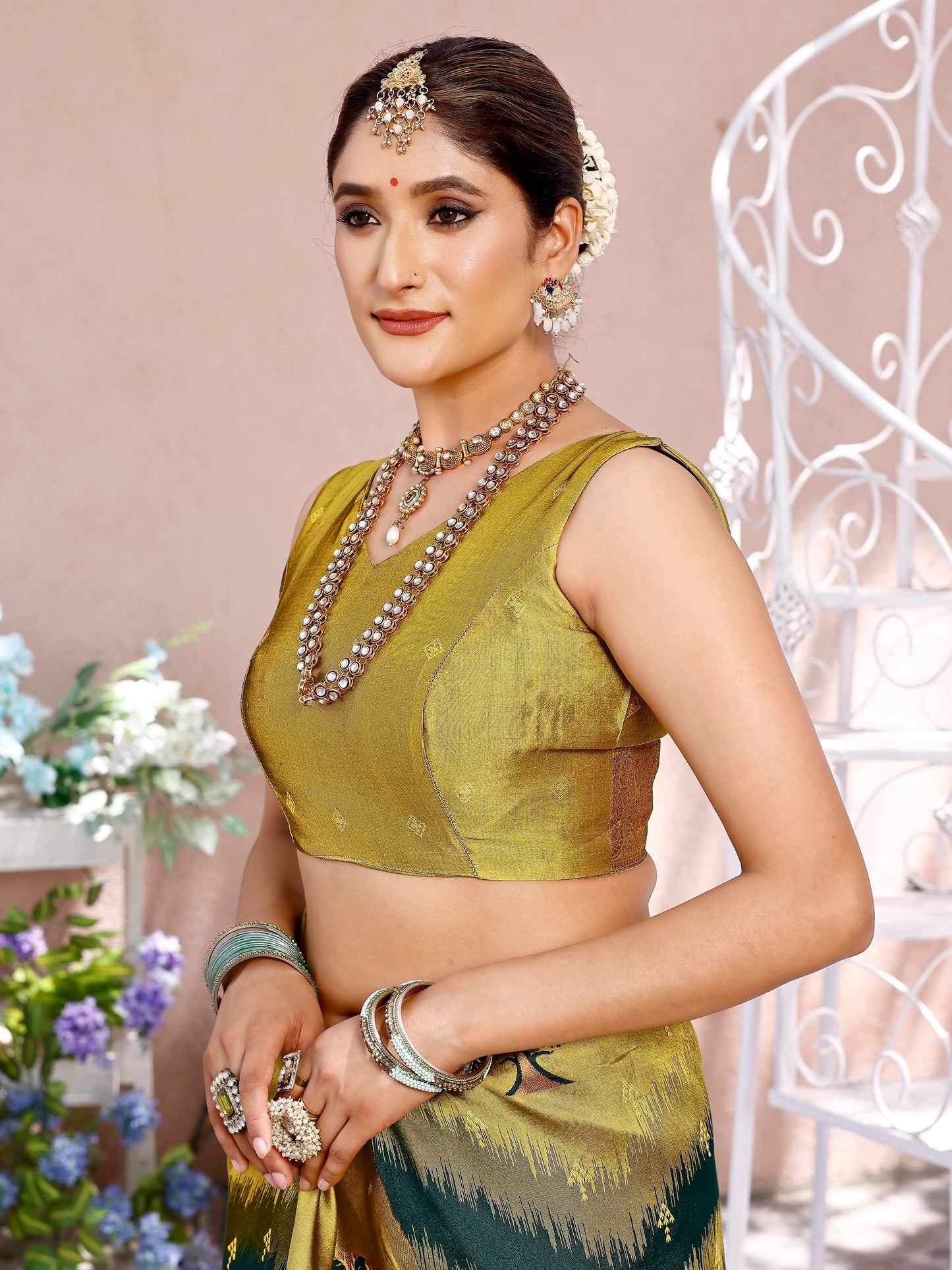 Charming Bottle Green and Coral Silk Saree with Intricate Zari Work