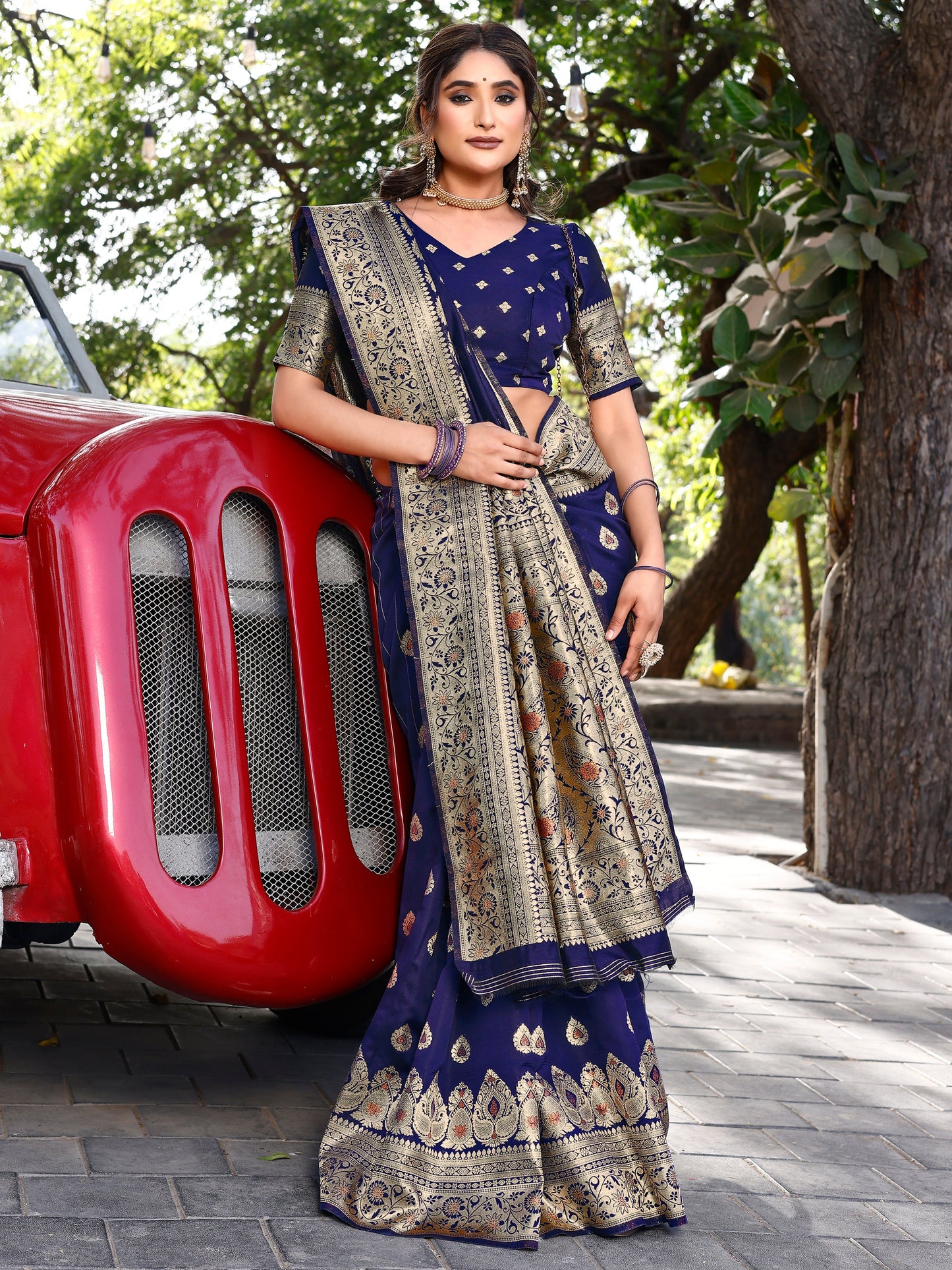 Majestic Magnificence Navy Blue and Coral Silk Saree with Intricate Zari Work