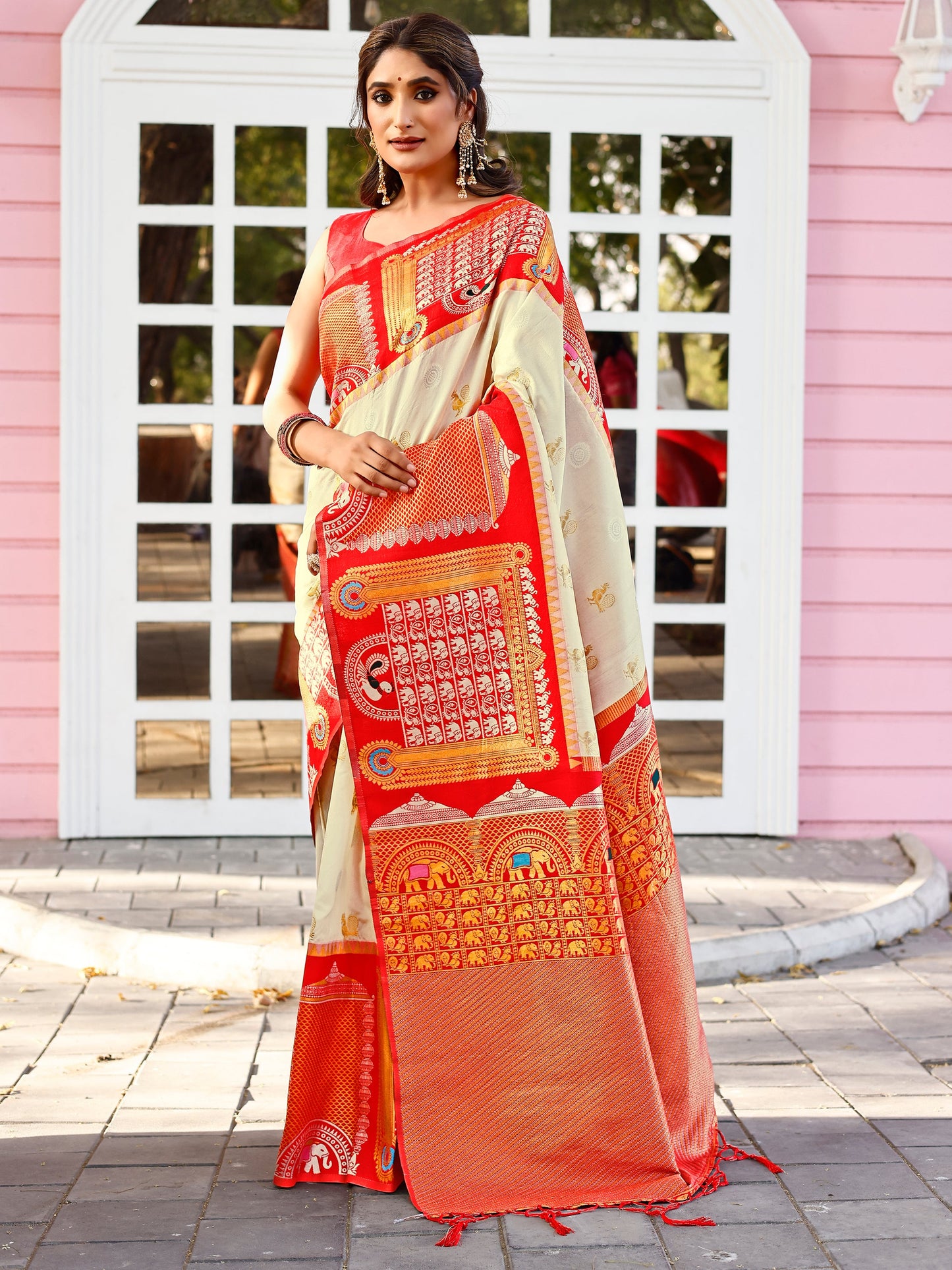 Supreme Off White and Coral Silk Saree with Intricate Zari Work