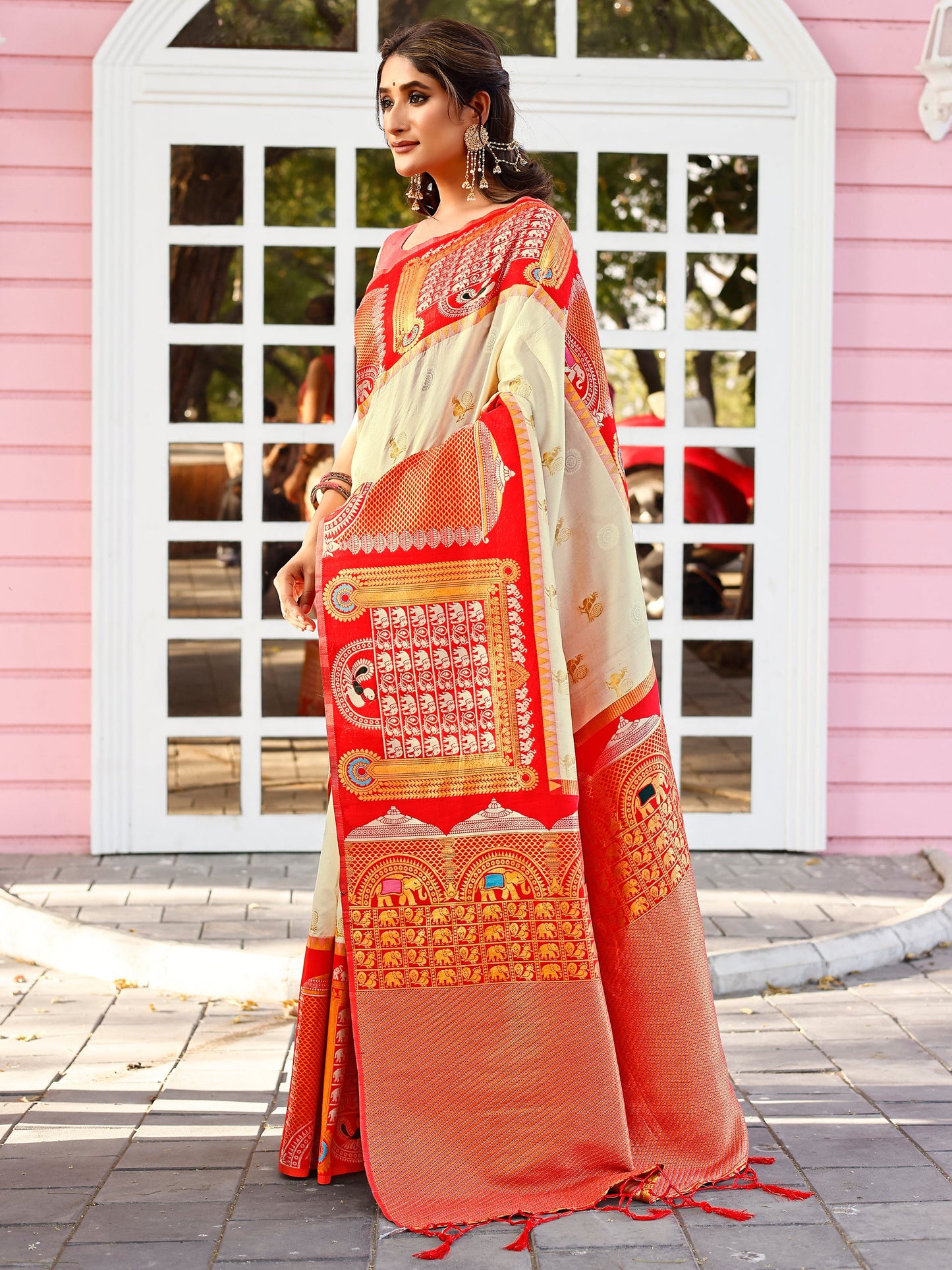 Supreme Off White and Coral Silk Saree with Intricate Zari Work