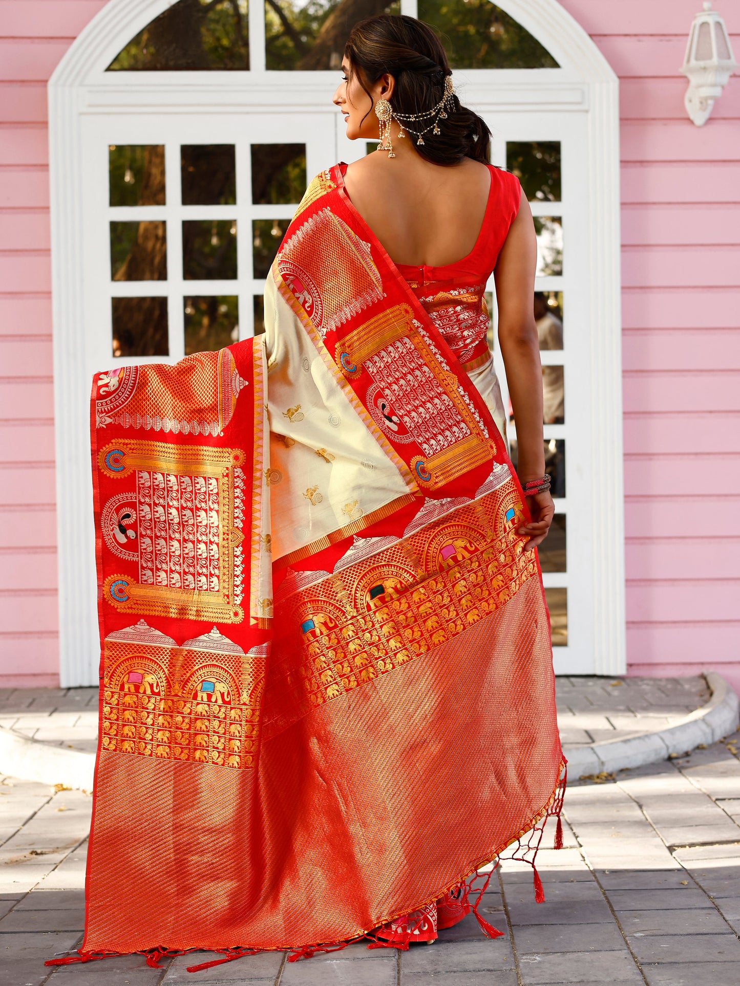 Supreme Off White and Coral Silk Saree with Intricate Zari Work
