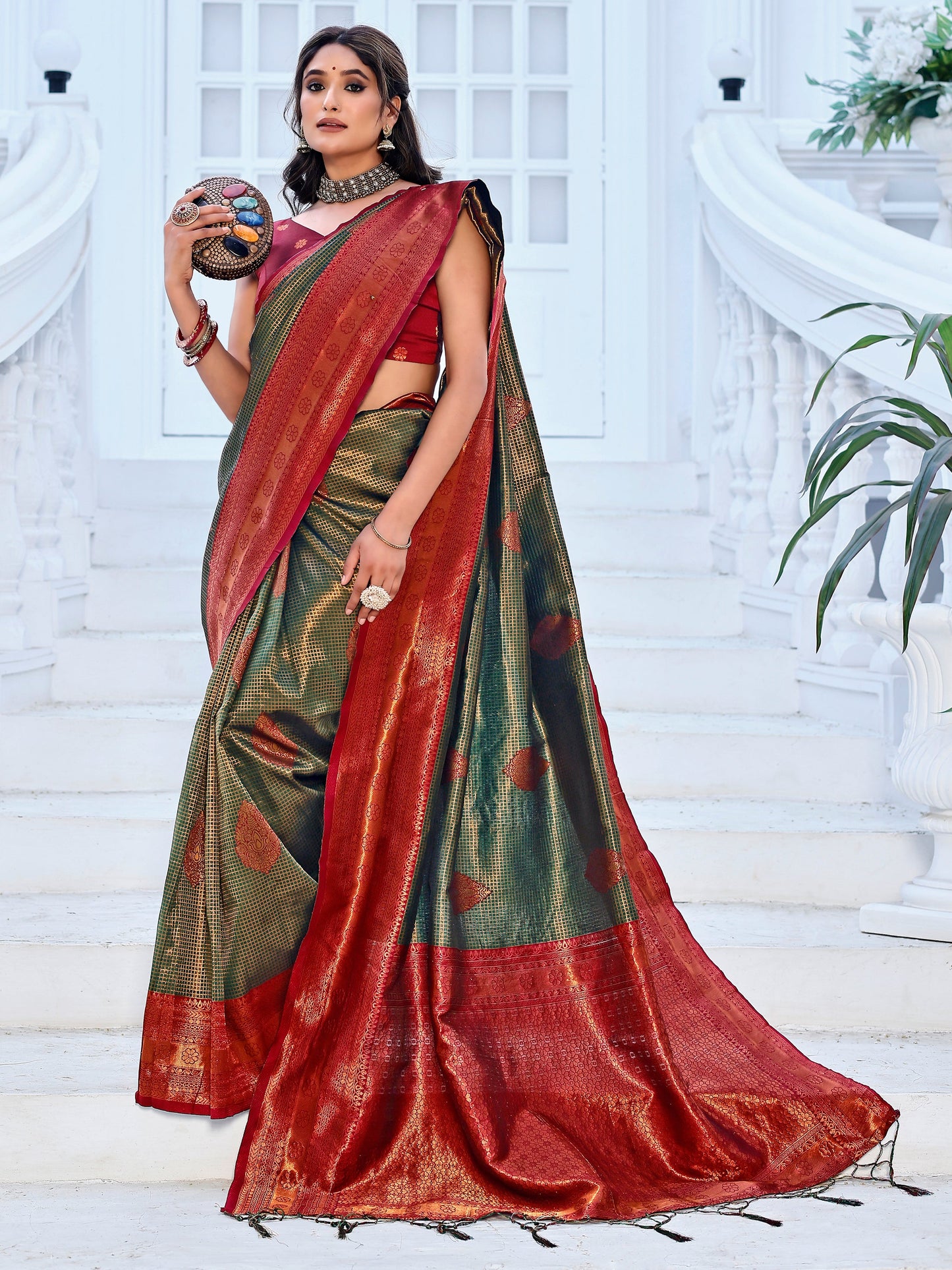 Regality Hunter Green and Coral Silk Saree with Intricate Zari Work