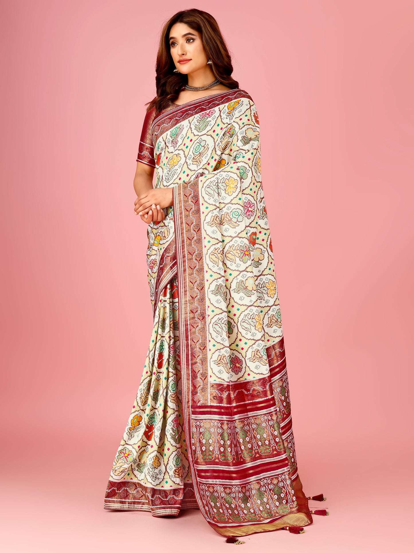 Maroon and Cream Color Women's Soft Patola Silk meenakari weawing motifs with Rich Zari Pallu and contrast border with Tessels.