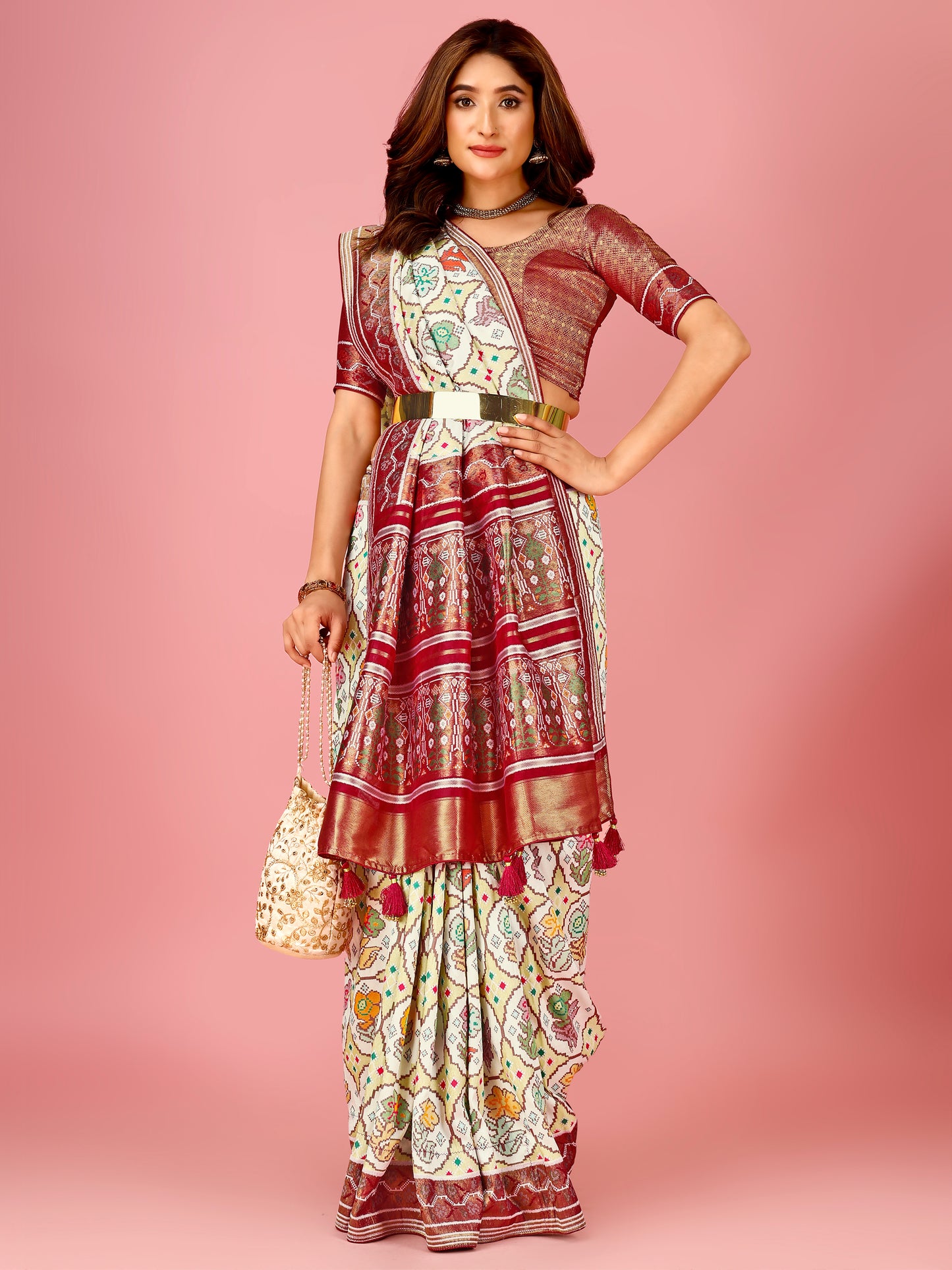 Maroon and Cream Color Women's Soft Patola Silk meenakari weawing motifs with Rich Zari Pallu and contrast border with Tessels.