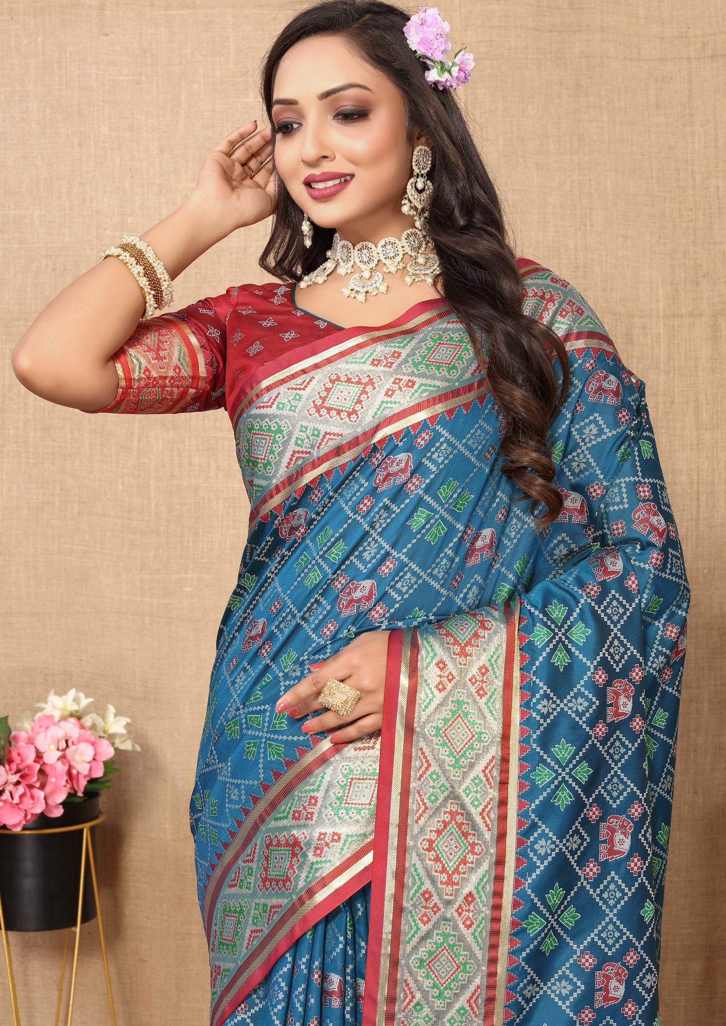 Blue & Maroon Color Women's Soft Patola Silk meenakari weawing motifs with Rich Zari Pallu and contrast border with Tessels.