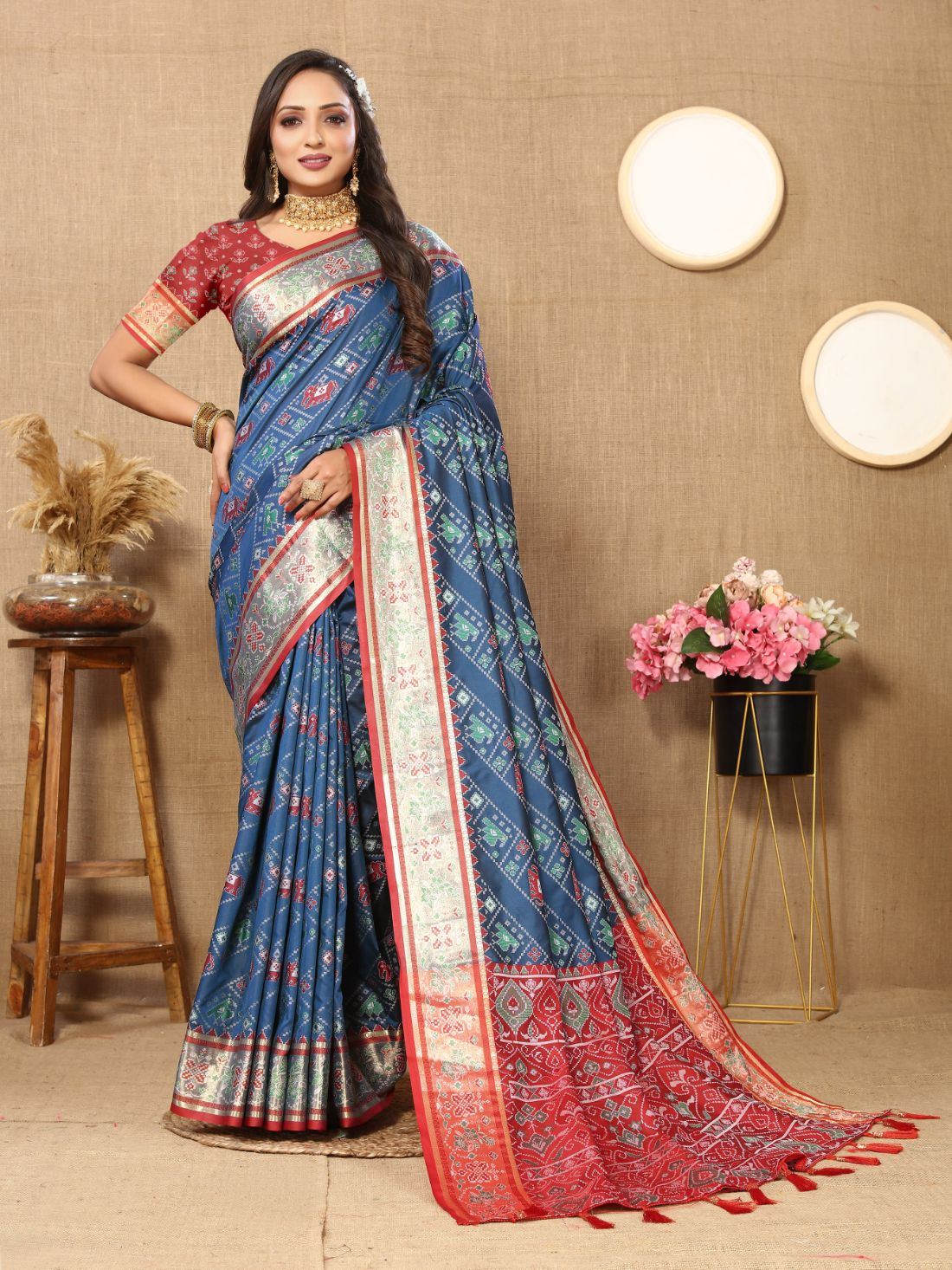 Blue & Maroon Color Women's Soft Patola Silk meenakari weawing motifs with Rich Zari Pallu and contrast border with Tessels.