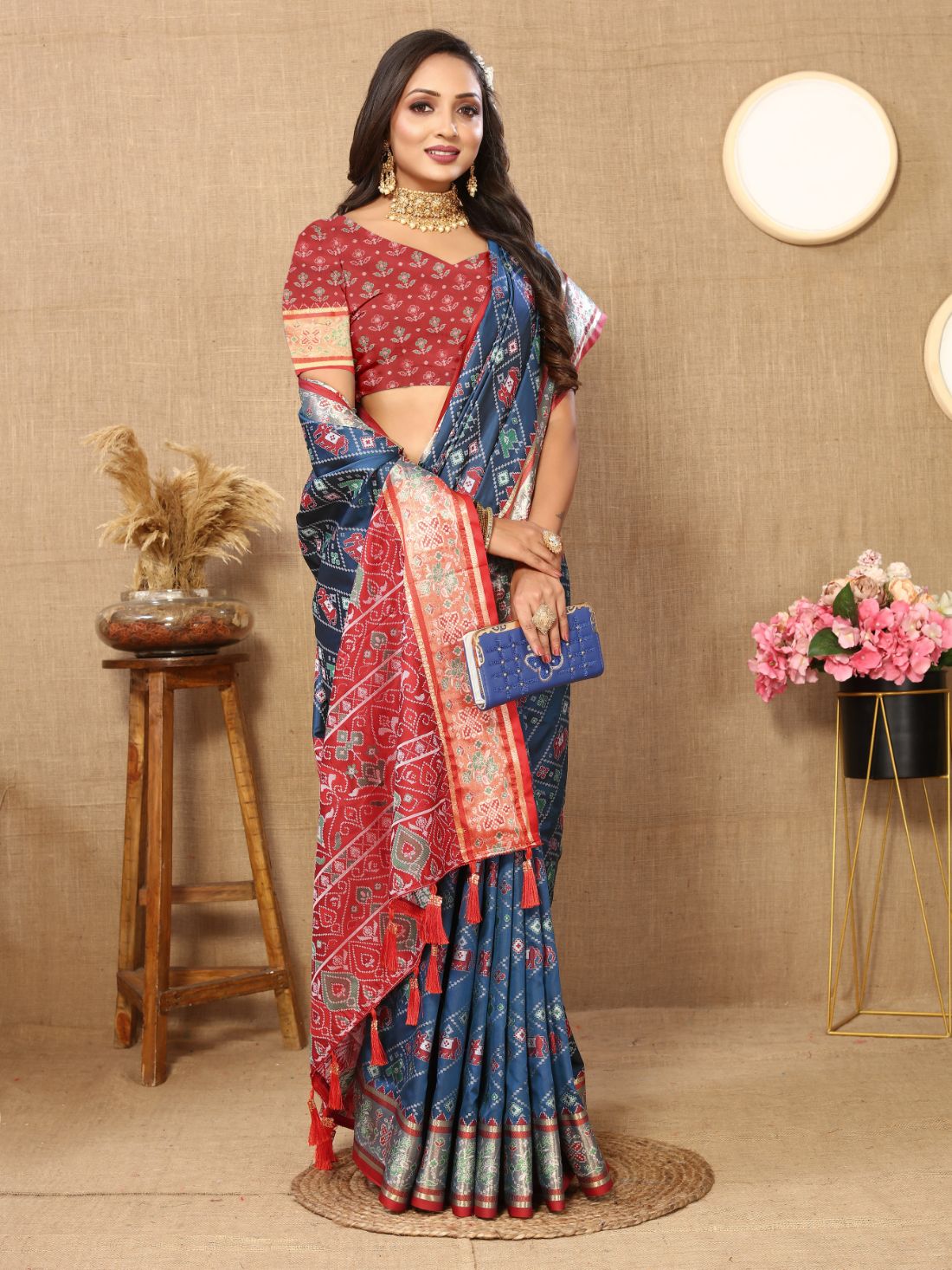 Blue & Maroon Color Women's Soft Patola Silk meenakari weawing motifs with Rich Zari Pallu and contrast border with Tessels.