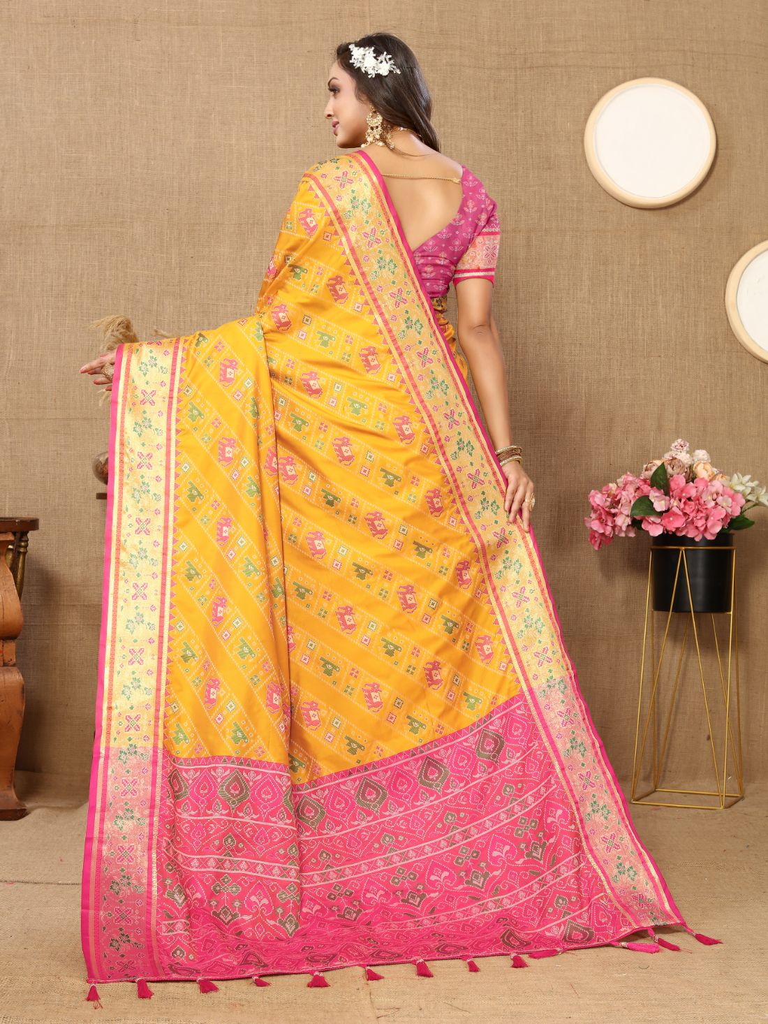 Mustered & Purple Color Women's Soft Patola Silk meenakari weawing motifs with Rich Zari Pallu and contrast border with Tessels.