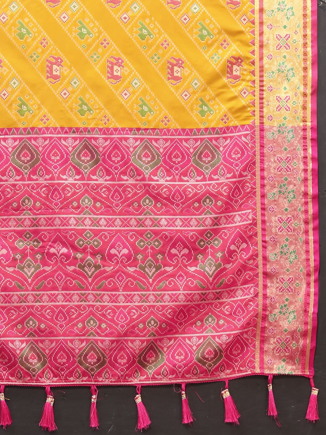 Mustered & Purple Color Women's Soft Patola Silk meenakari weawing motifs with Rich Zari Pallu and contrast border with Tessels.