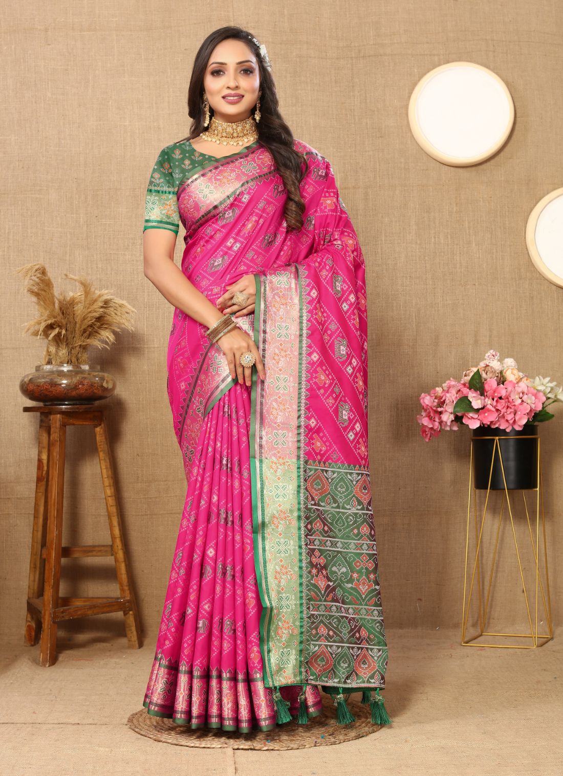 Pink & Green Color Women's Soft Patola Silk meenakari weawing motifs with Rich Zari Pallu and contrast border with Tessels.