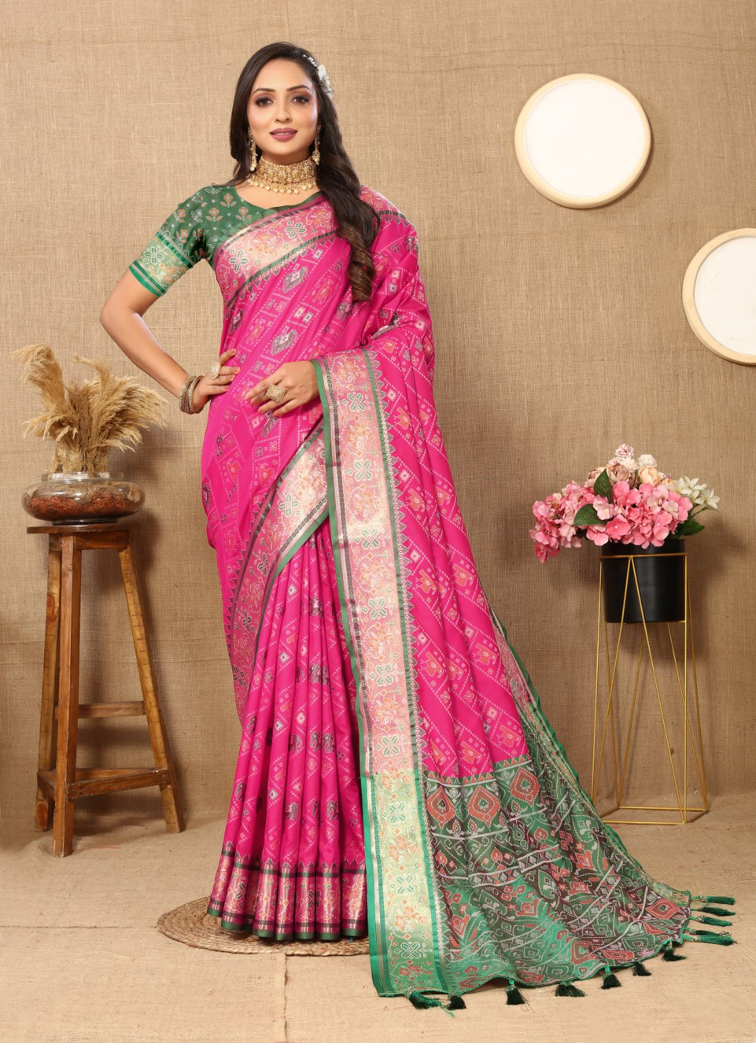 Pink & Green Color Women's Soft Patola Silk meenakari weawing motifs with Rich Zari Pallu and contrast border with Tessels.