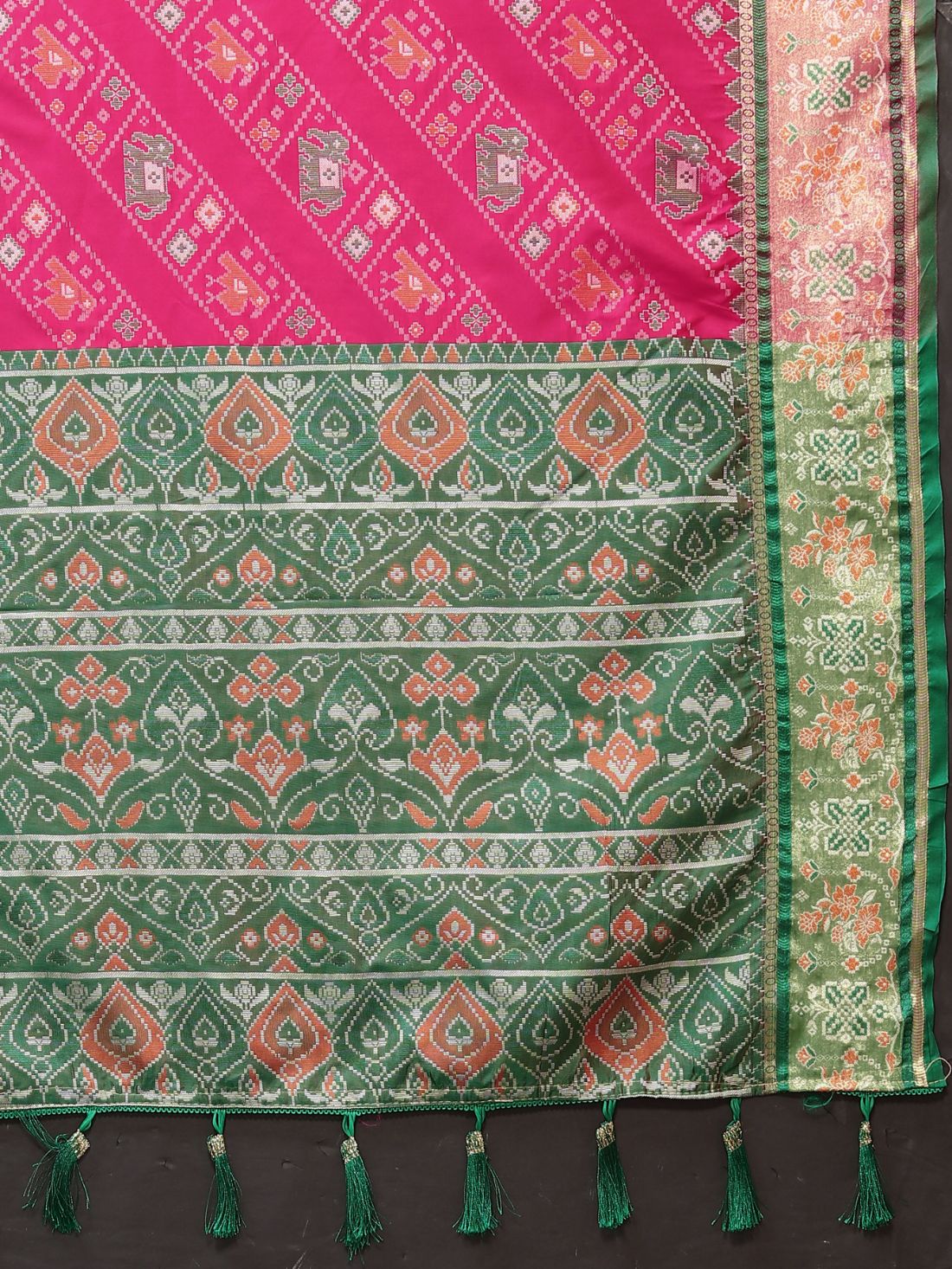 Pink & Green Color Women's Soft Patola Silk meenakari weawing motifs with Rich Zari Pallu and contrast border with Tessels.