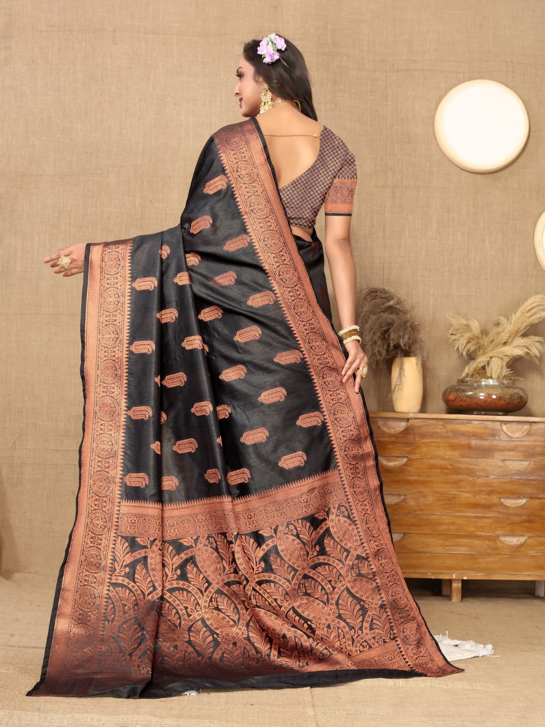 Black Color Soft katan silk saree with copper zari weawing design and Rich Zari weawing Pallu with Unstiched Blouse piece.