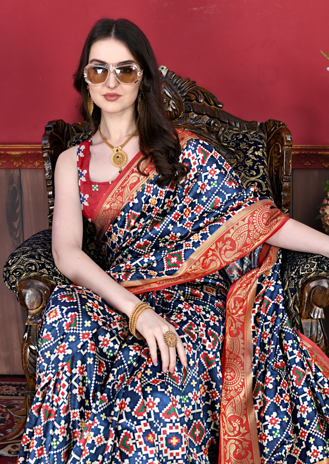 Nevy Blue Color Women's Soft Patola Silk meenakari weawing motifs with Rich Zari Pallu and contrast border with Tessels.