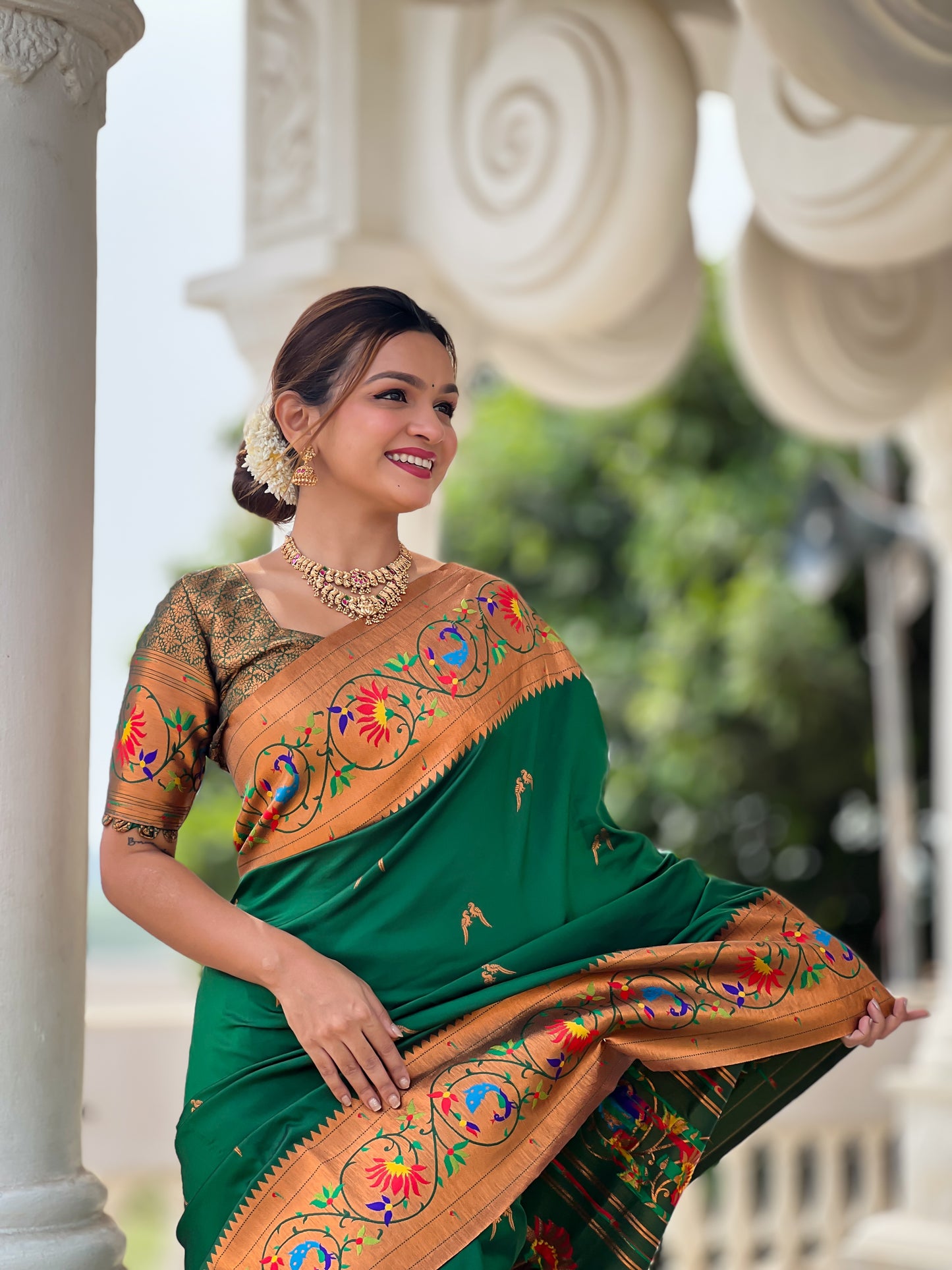 Luxurious Green Paithani Saree With Intricate Gold Minakari Motifs Design