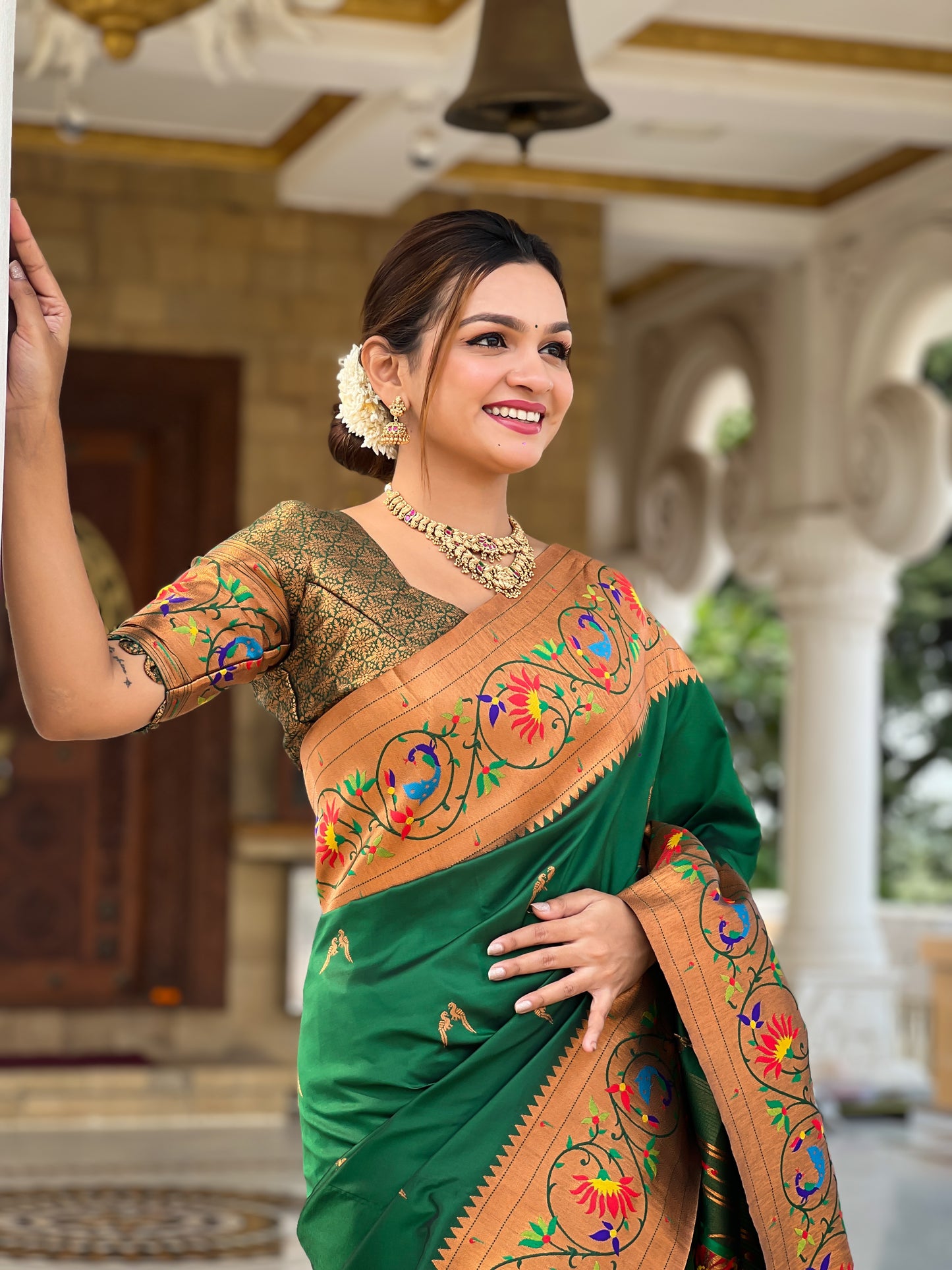 Luxurious Green Paithani Saree With Intricate Gold Minakari Motifs Design