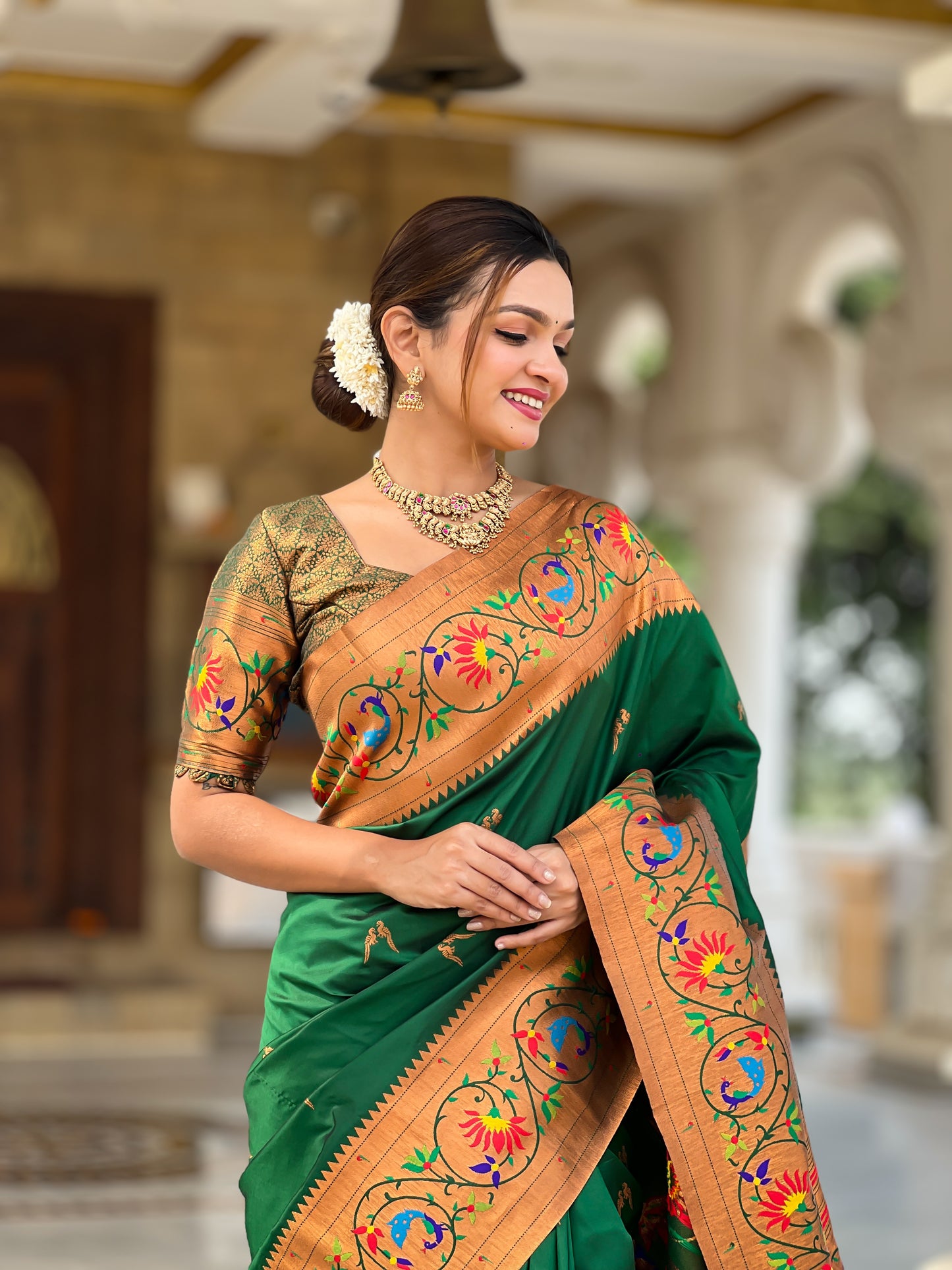 Luxurious Green Paithani Saree With Intricate Gold Minakari Motifs Design