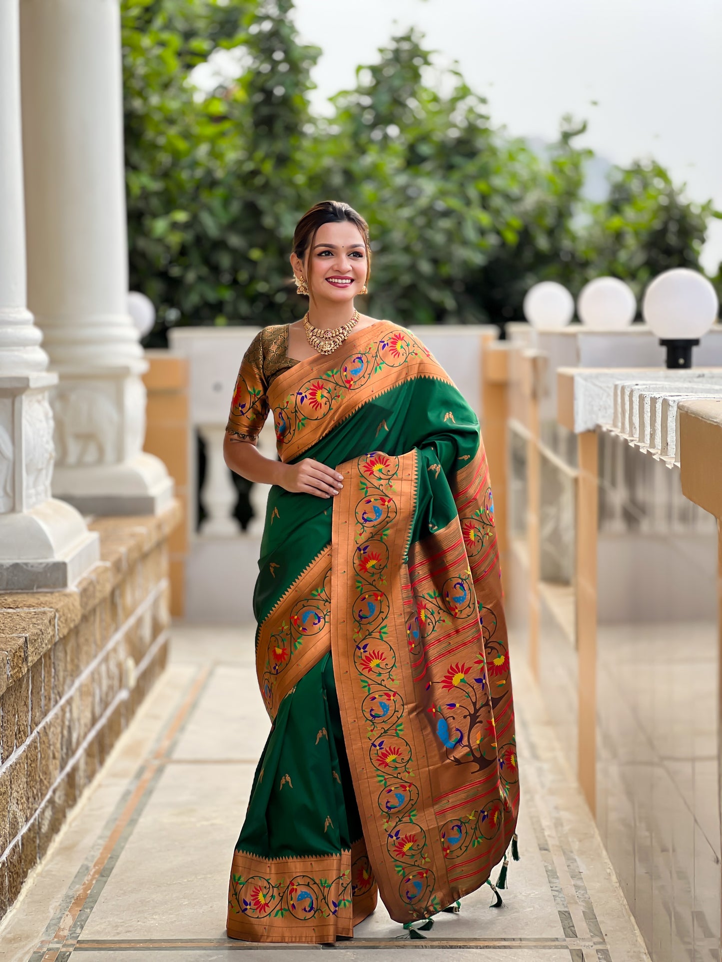 Luxurious Green Paithani Saree With Intricate Gold Minakari Motifs Design