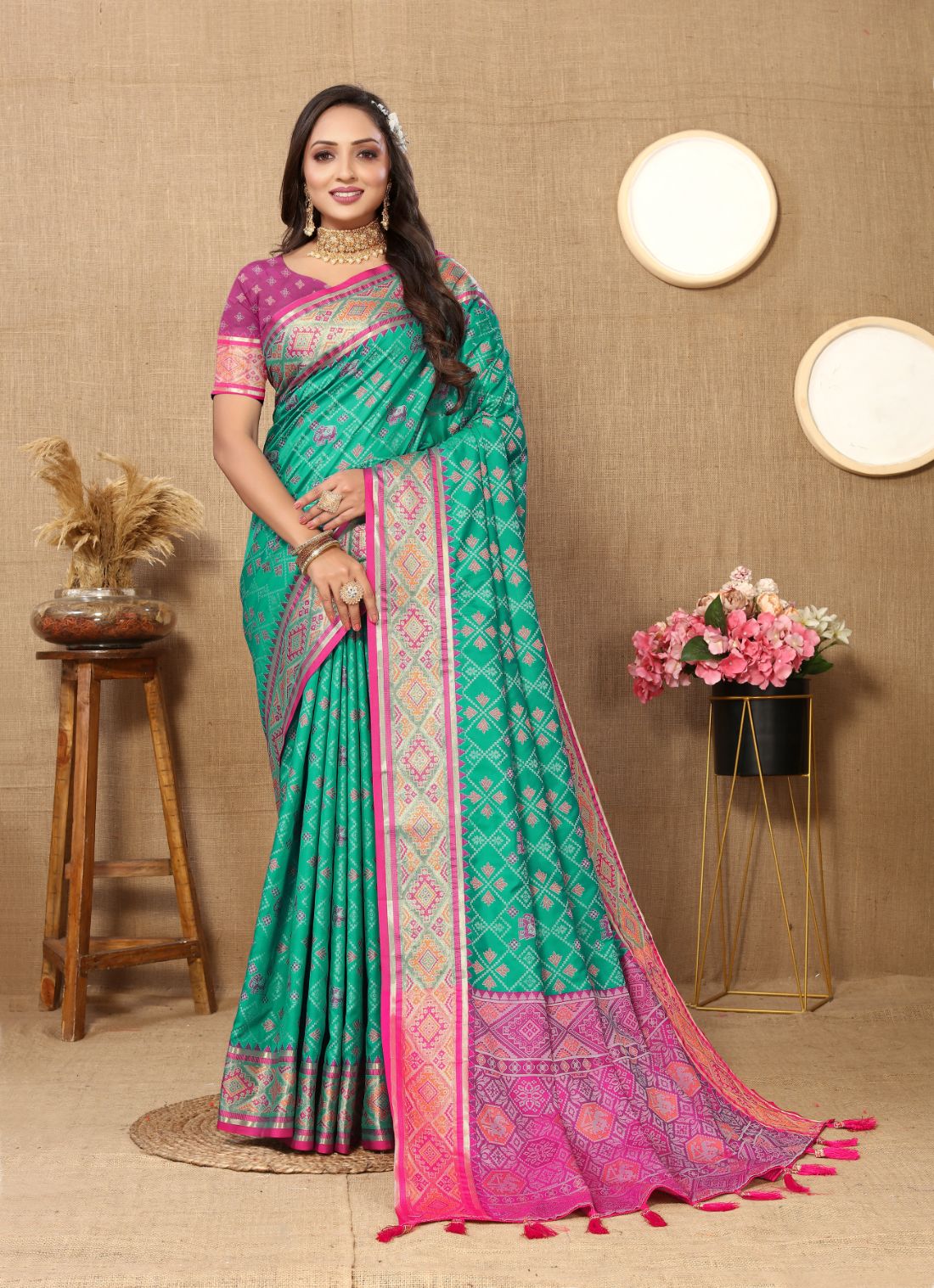 Aqua Blue & Pink Color Women's Soft Patola Silk meenakari weawing motifs with Rich Zari Pallu and contrast border with Tessels.