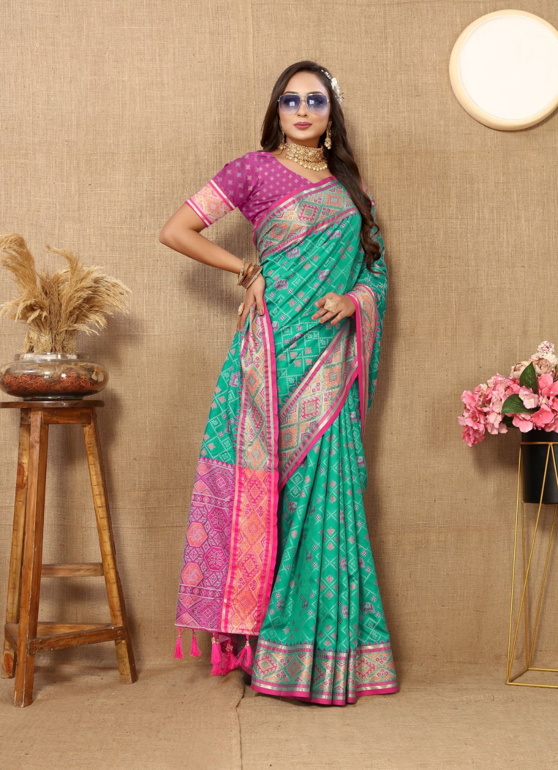 Aqua Blue & Pink Color Women's Soft Patola Silk meenakari weawing motifs with Rich Zari Pallu and contrast border with Tessels.