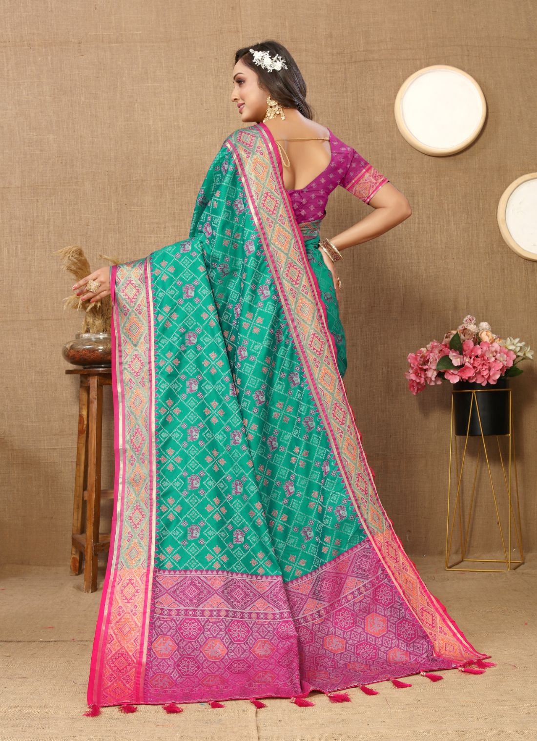 Aqua Blue & Pink Color Women's Soft Patola Silk meenakari weawing motifs with Rich Zari Pallu and contrast border with Tessels.