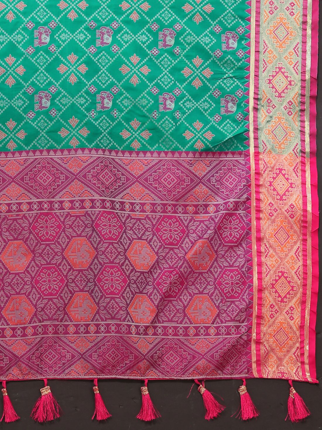 Aqua Blue & Pink Color Women's Soft Patola Silk meenakari weawing motifs with Rich Zari Pallu and contrast border with Tessels.