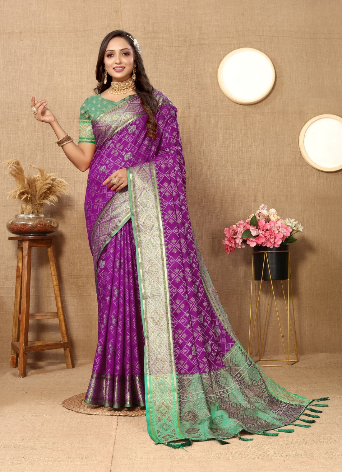 Purple & Green Color Women's Soft Patola Silk meenakari weawing motifs with Rich Zari Pallu and contrast border with Tessels.