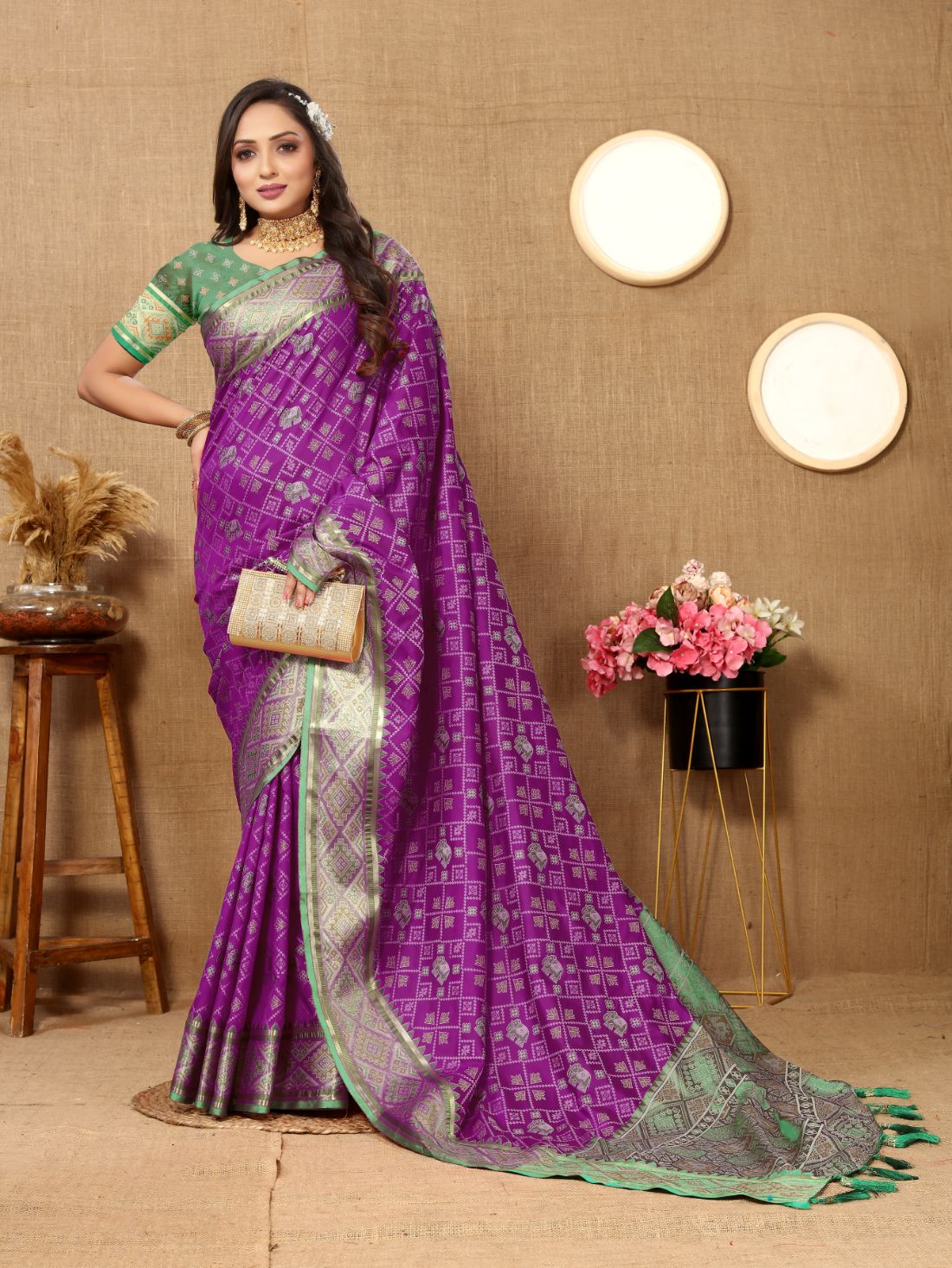 Purple & Green Color Women's Soft Patola Silk meenakari weawing motifs with Rich Zari Pallu and contrast border with Tessels.