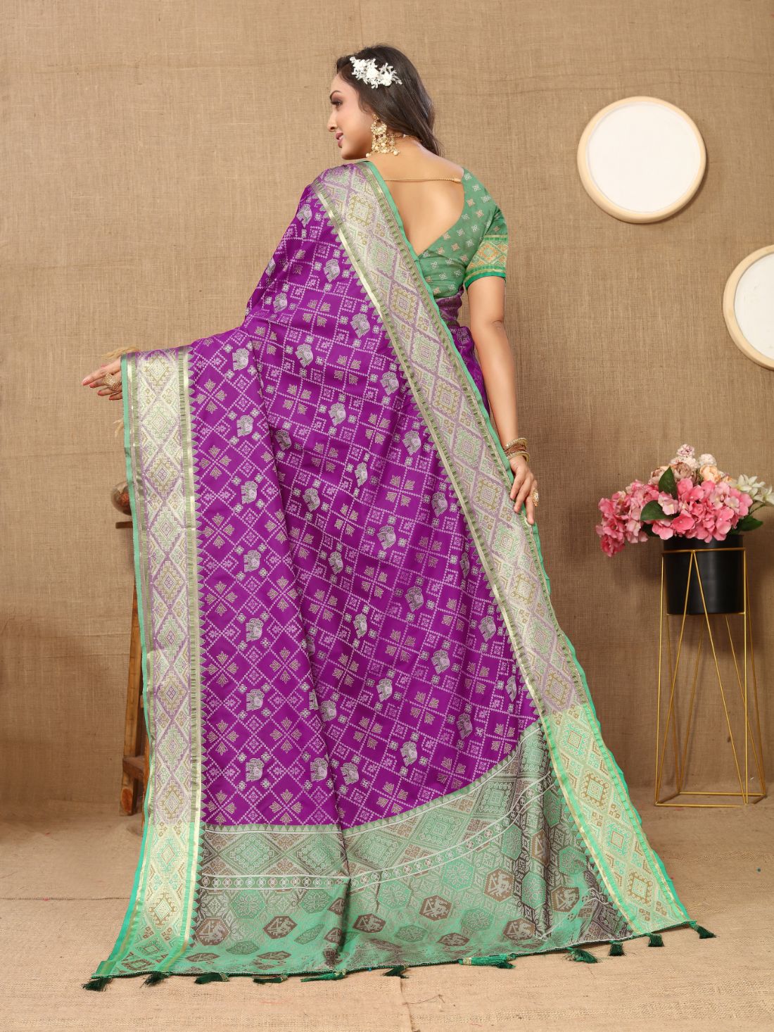 Purple & Green Color Women's Soft Patola Silk meenakari weawing motifs with Rich Zari Pallu and contrast border with Tessels.