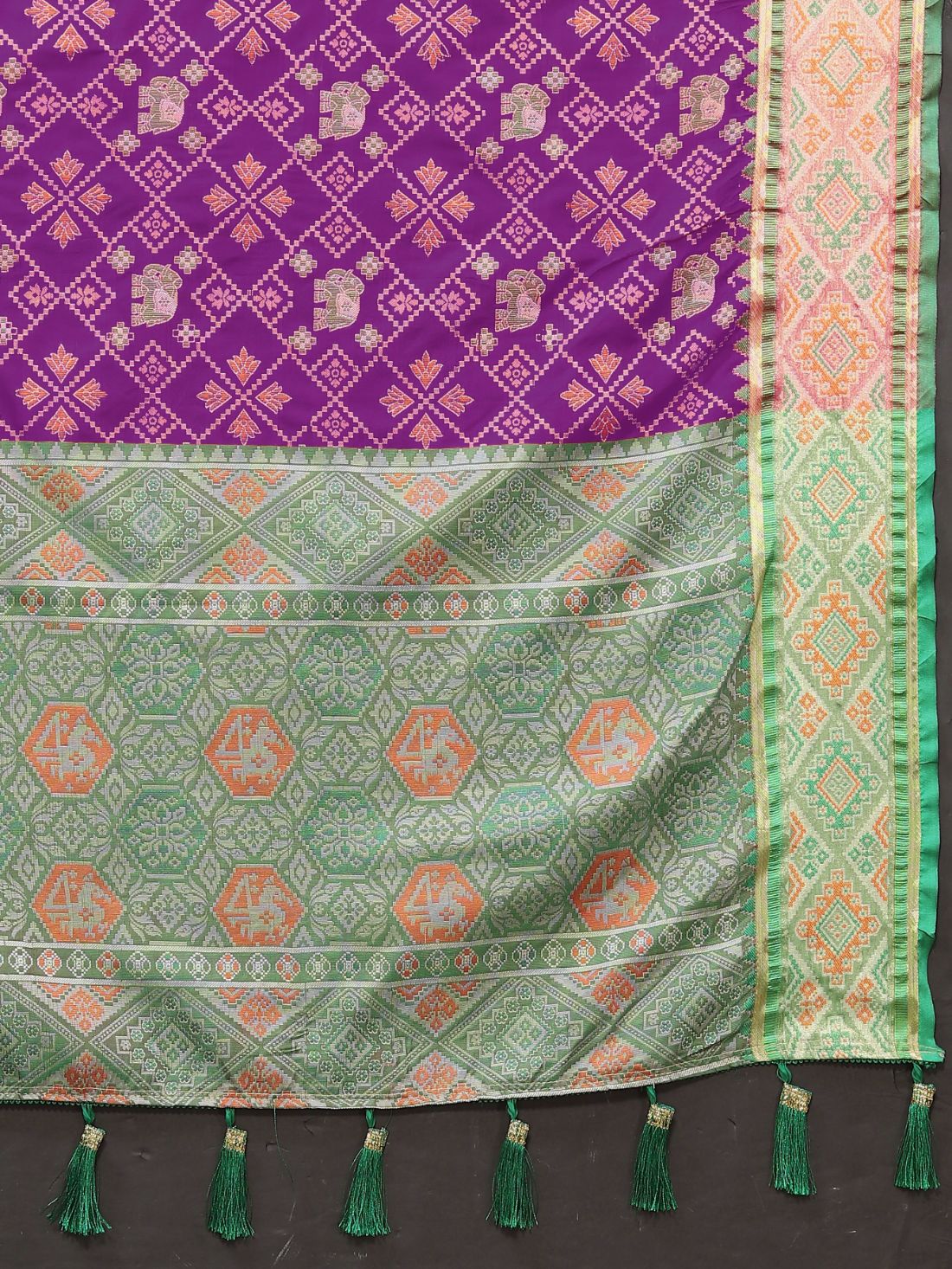 Purple & Green Color Women's Soft Patola Silk meenakari weawing motifs with Rich Zari Pallu and contrast border with Tessels.