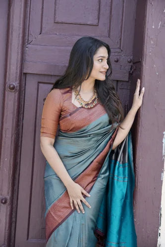 Pure Banarasi Silk Saree With Twirling Blouse Piece.