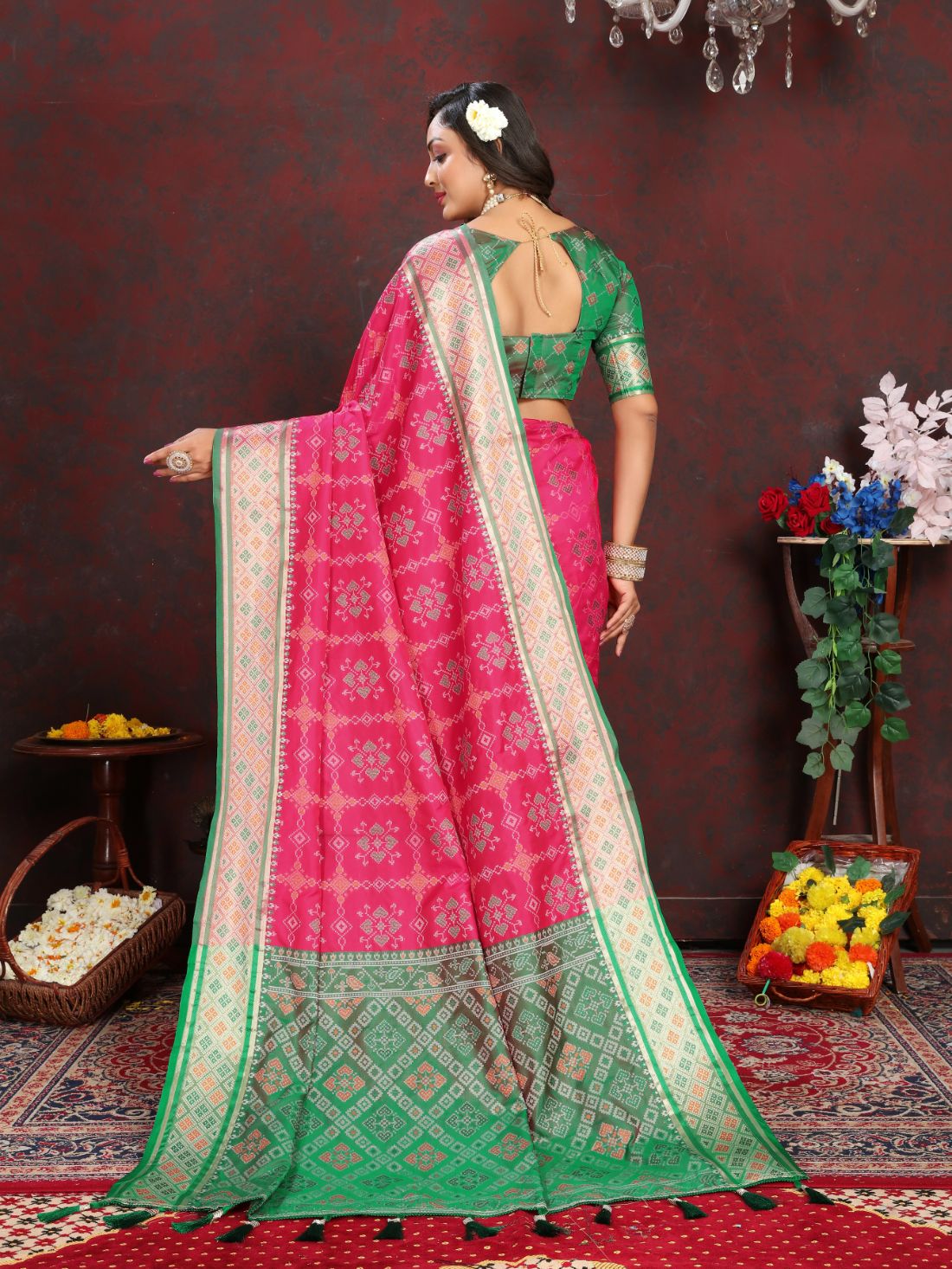 Pink & Green Color Women's Soft Patola Silk meenakari weawing motifs with Rich Zari Pallu and contrast border with Tessels.