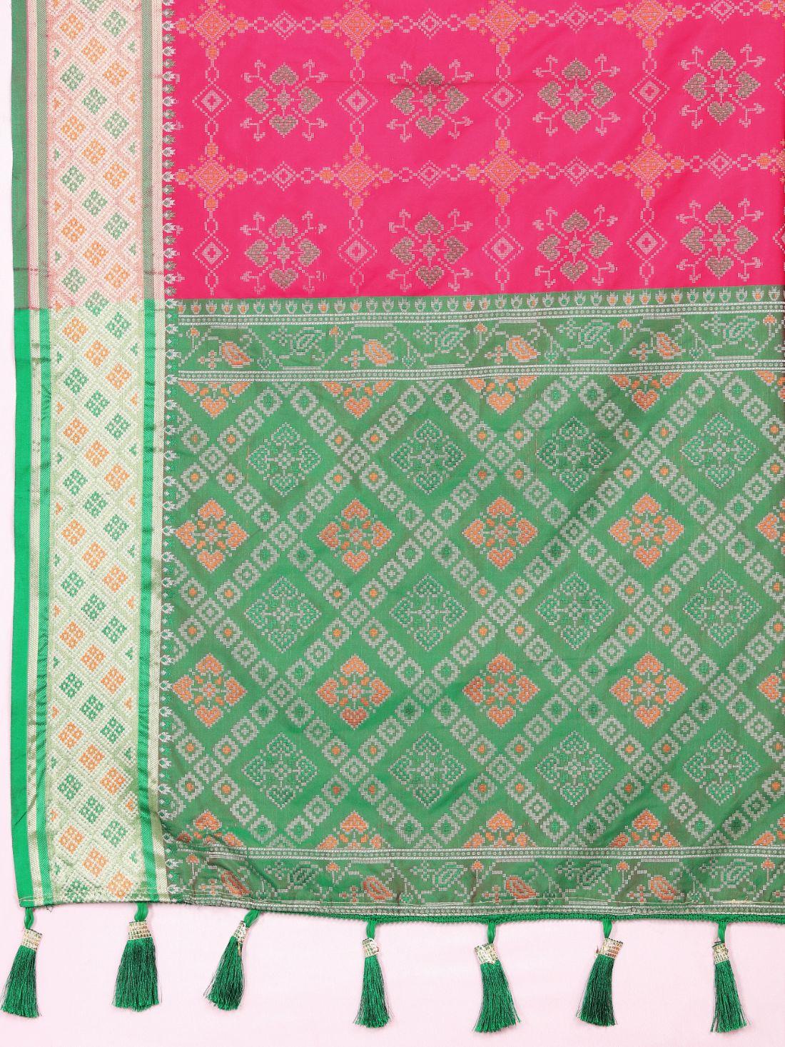 Pink & Green Color Women's Soft Patola Silk meenakari weawing motifs with Rich Zari Pallu and contrast border with Tessels.