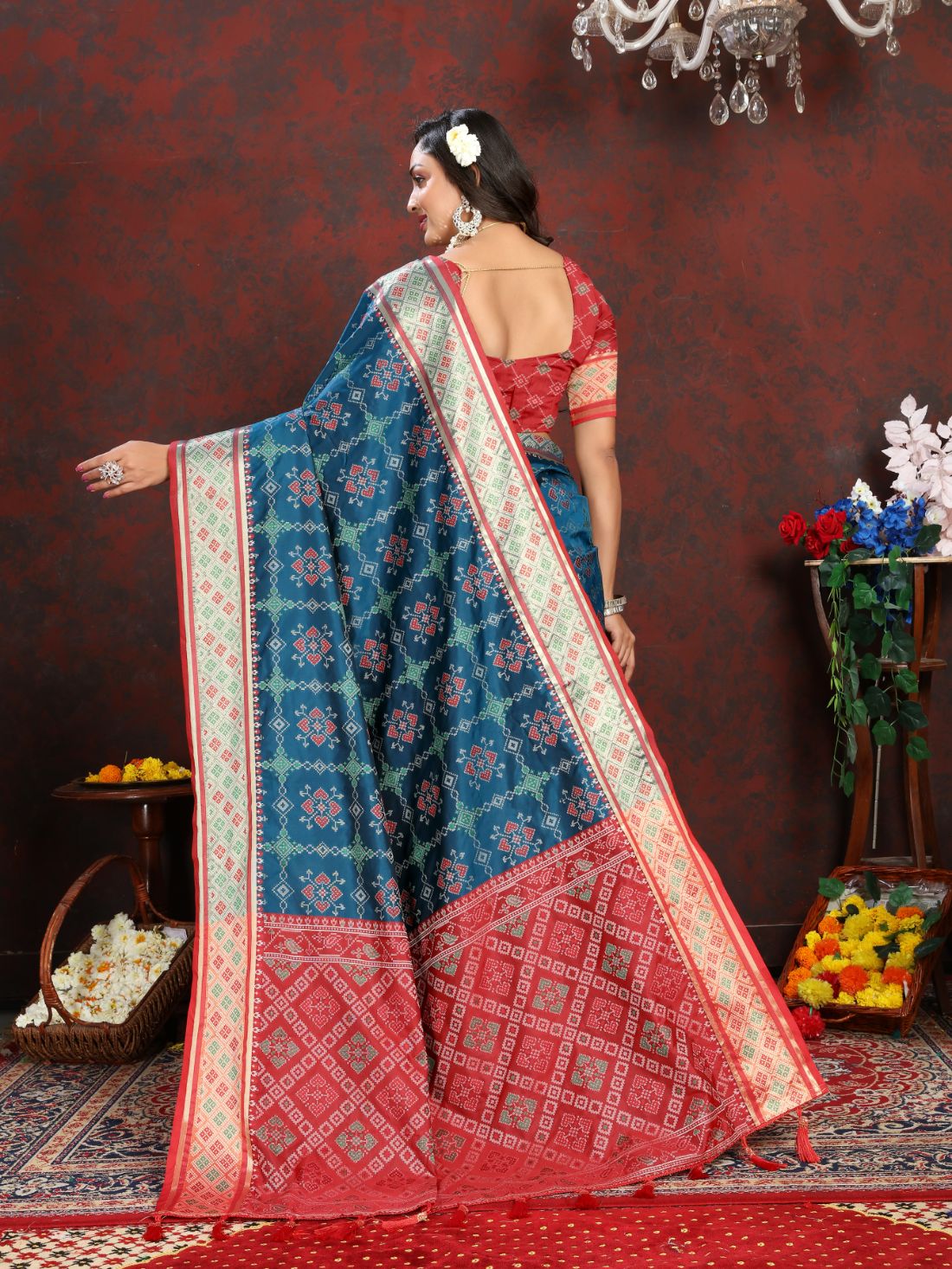 Blue & Red Color Women's Soft Patola Silk meenakari weawing motifs with Rich Zari Pallu and contrast border with Tessels.