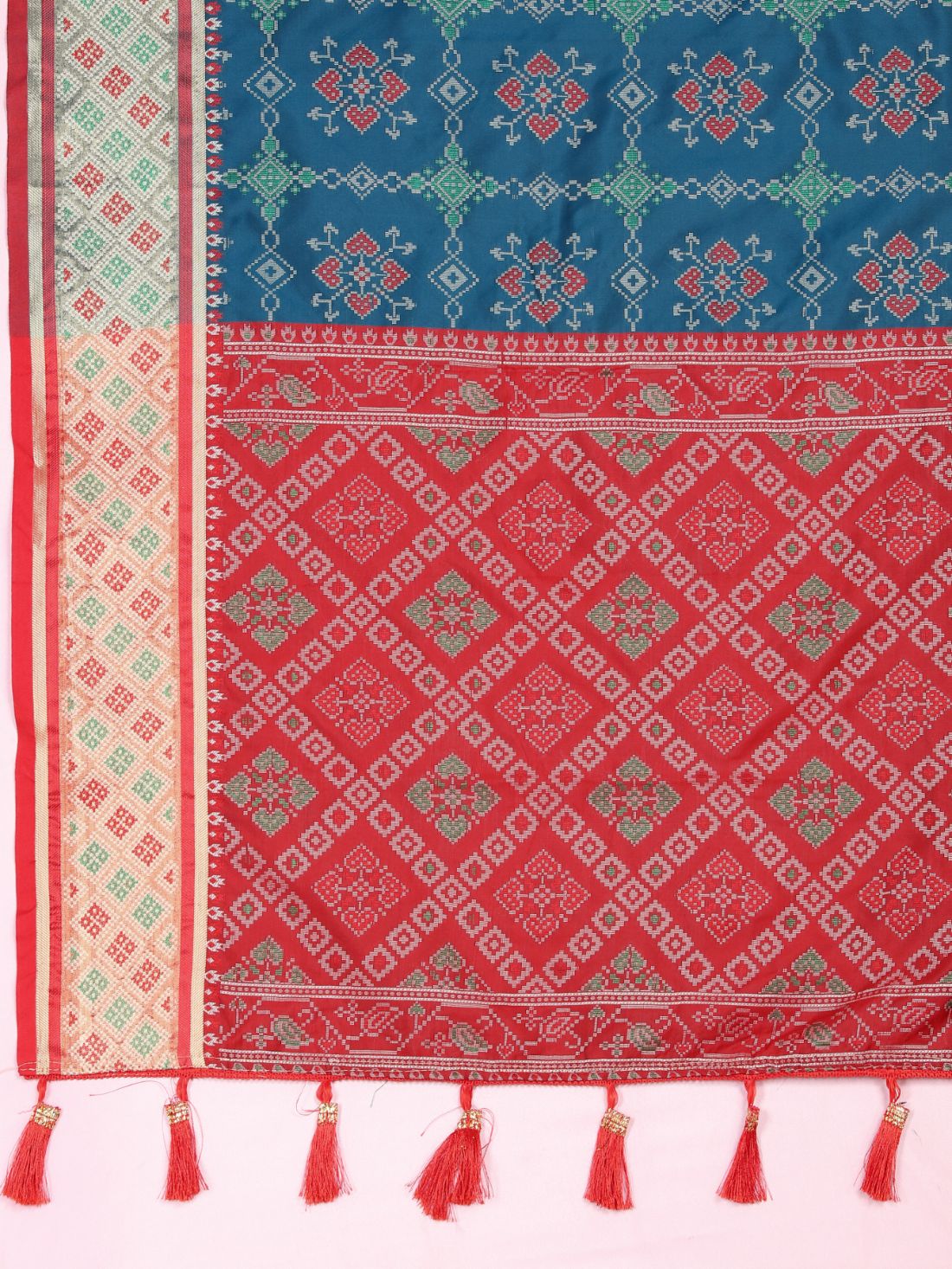 Blue & Red Color Women's Soft Patola Silk meenakari weawing motifs with Rich Zari Pallu and contrast border with Tessels.