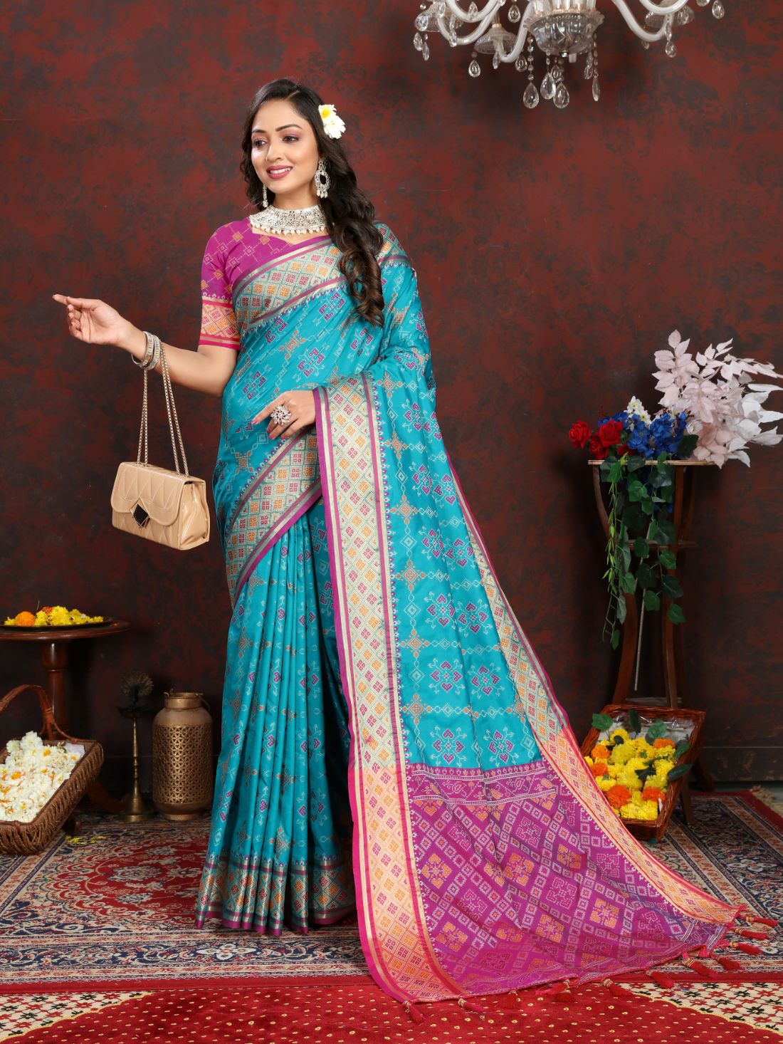 Light Blue & Pink Color Women's Soft Patola Silk meenakari weawing motifs with Rich Zari Pallu and contrast border with Tessels.