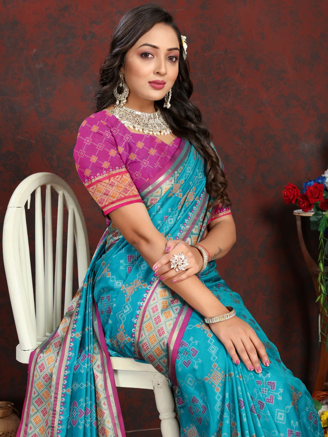 Light Blue & Pink Color Women's Soft Patola Silk meenakari weawing motifs with Rich Zari Pallu and contrast border with Tessels.