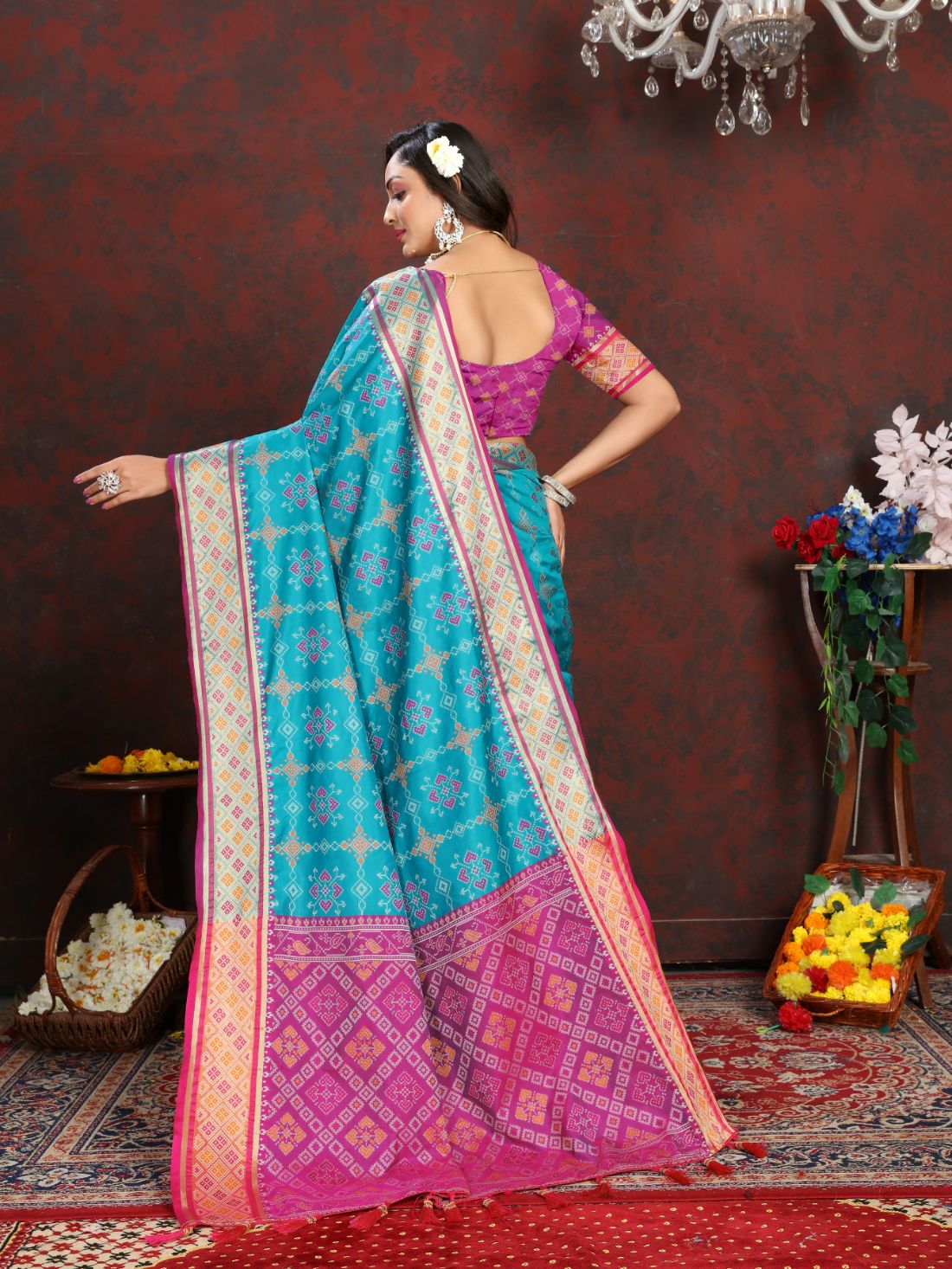 Light Blue & Pink Color Women's Soft Patola Silk meenakari weawing motifs with Rich Zari Pallu and contrast border with Tessels.
