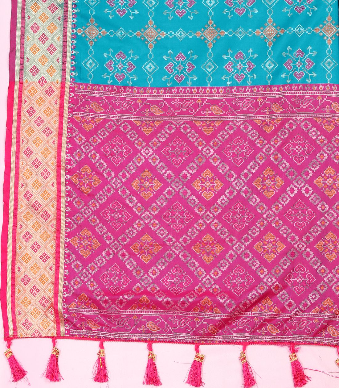 Light Blue & Pink Color Women's Soft Patola Silk meenakari weawing motifs with Rich Zari Pallu and contrast border with Tessels.
