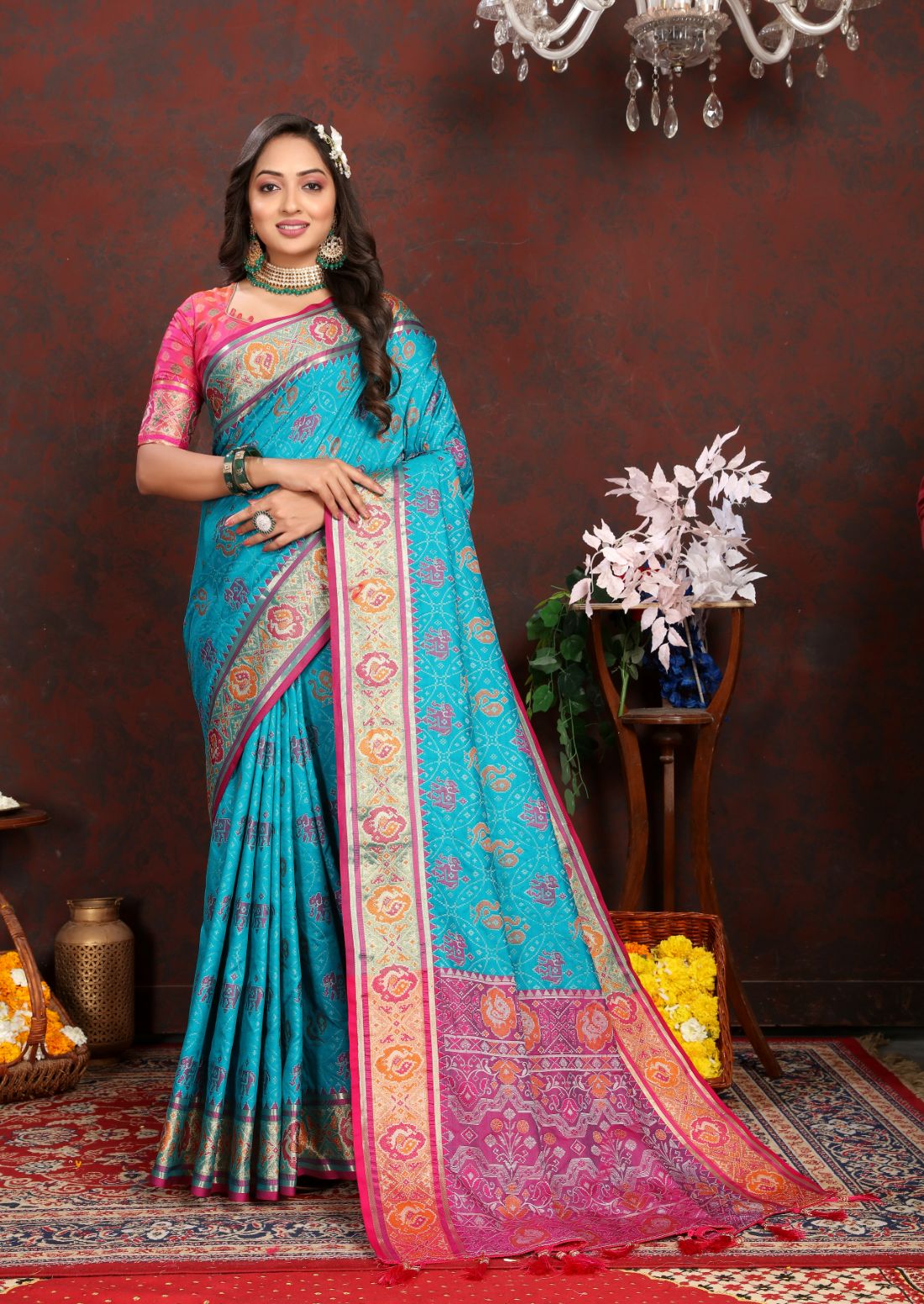 Light Blue & Pink Women's Soft Patola Silk meenakari weawing motifs with Rich Zari Pallu and contrast border with Tessels.