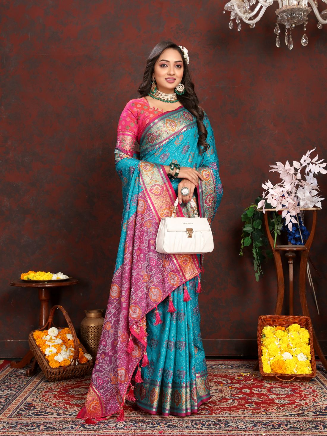 Light Blue & Pink Women's Soft Patola Silk meenakari weawing motifs with Rich Zari Pallu and contrast border with Tessels.