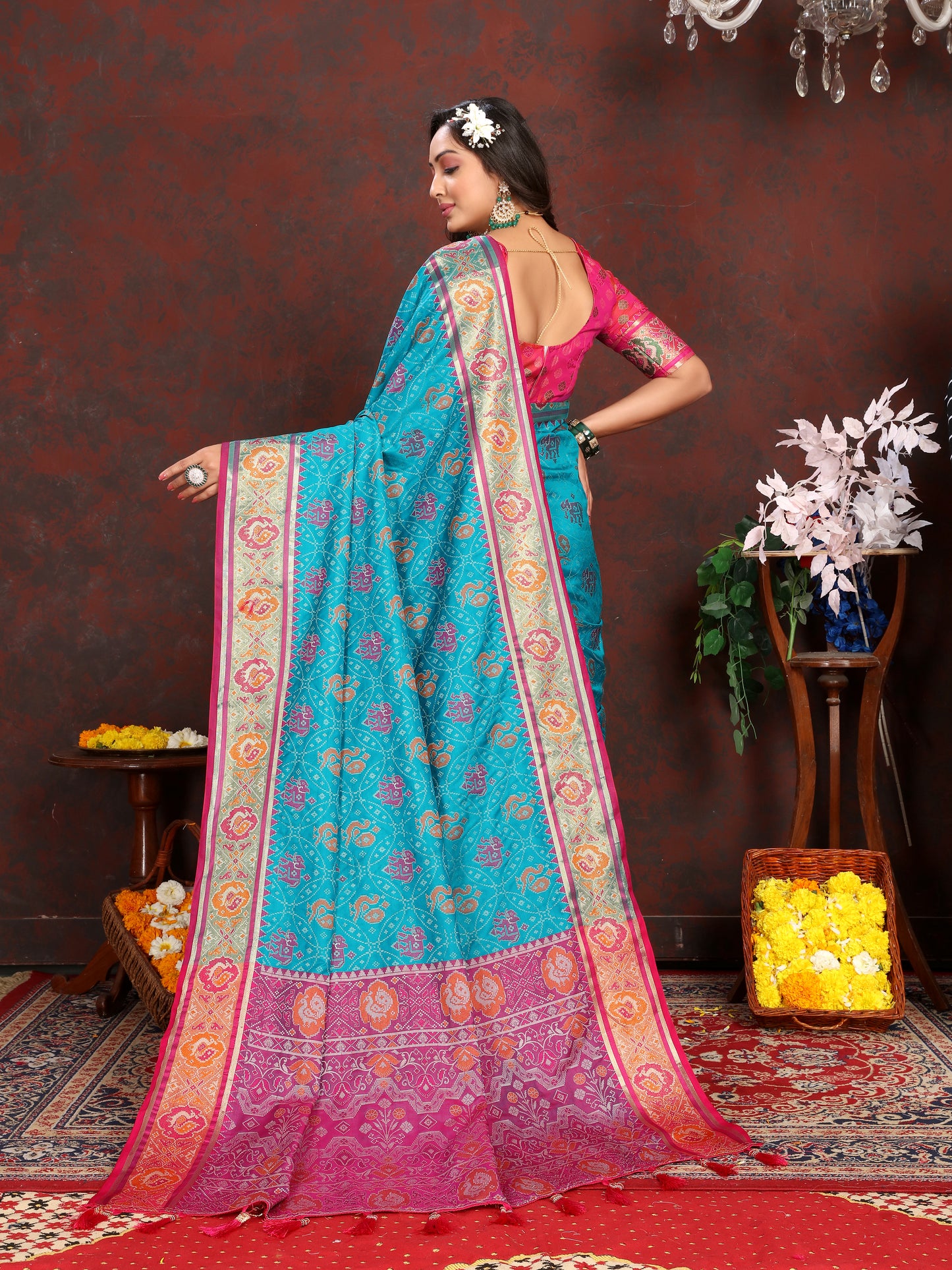 Light Blue & Pink Women's Soft Patola Silk meenakari weawing motifs with Rich Zari Pallu and contrast border with Tessels.