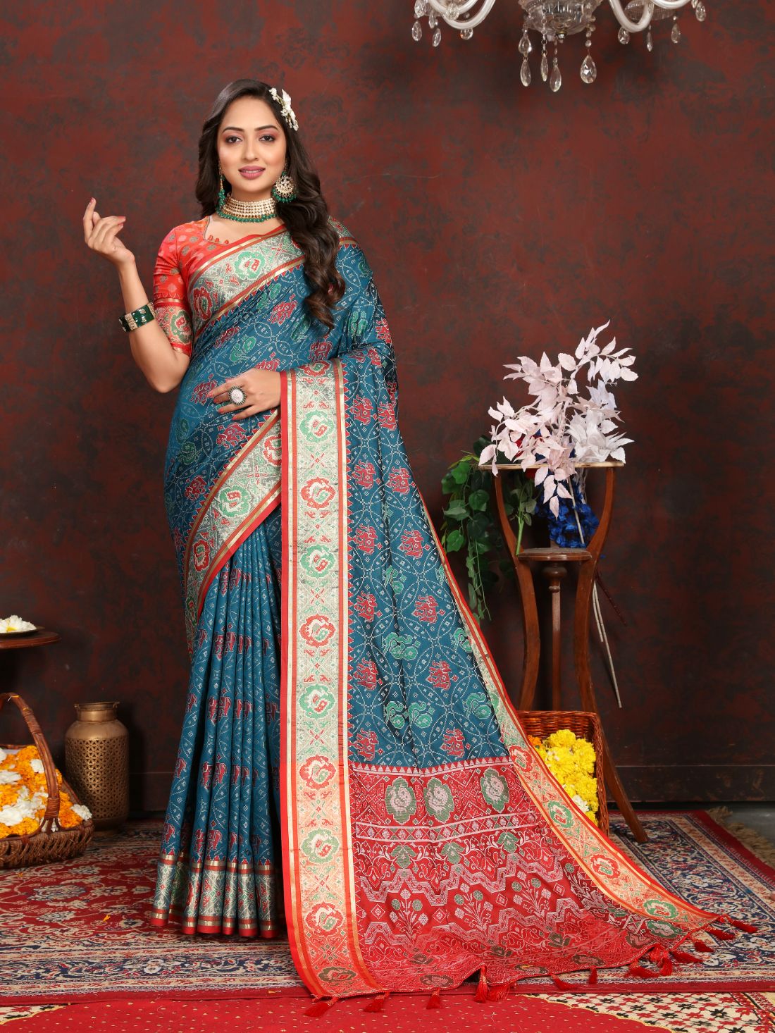 Nevy Blue & Red Women's Soft Patola Silk meenakari weawing motifs with Rich Zari Pallu and contrast border with Tessels.