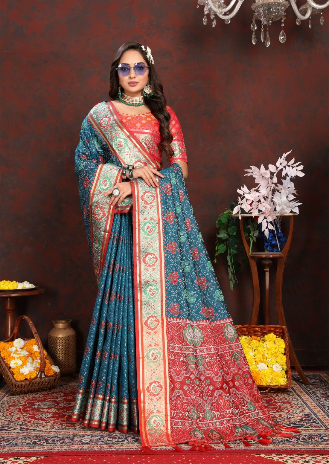 Nevy Blue & Red Women's Soft Patola Silk meenakari weawing motifs with Rich Zari Pallu and contrast border with Tessels.