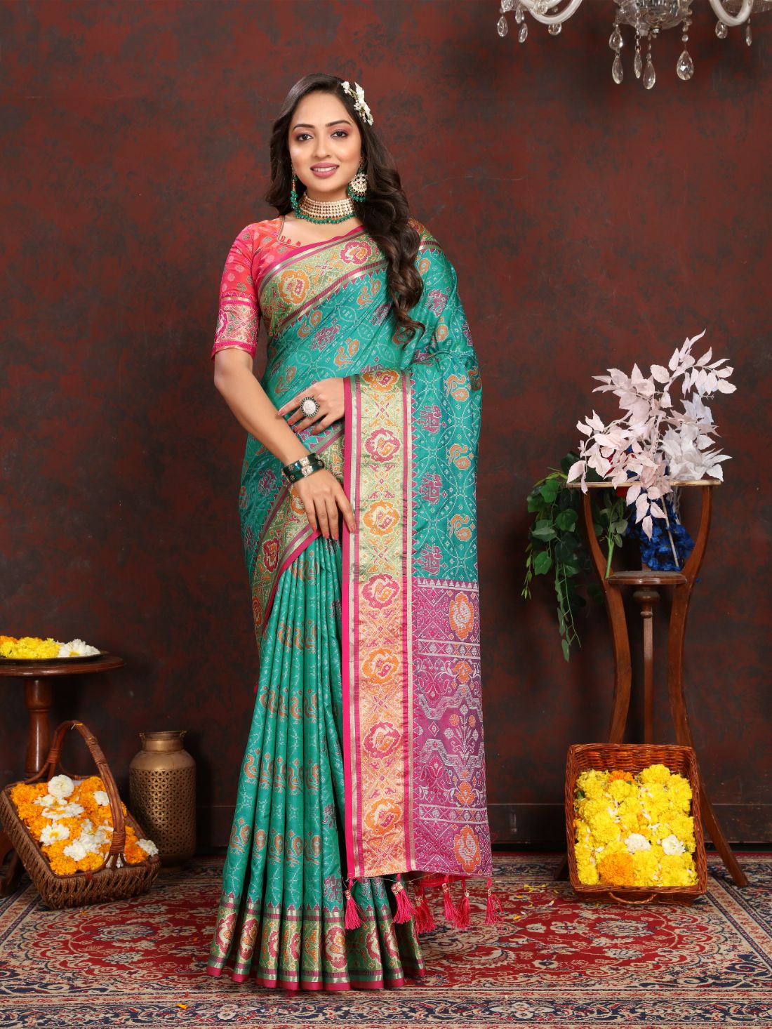 Aqua Blue & Pink Women's Soft Patola Silk meenakari weawing motifs with Rich Zari Pallu and contrast border with Tessels.