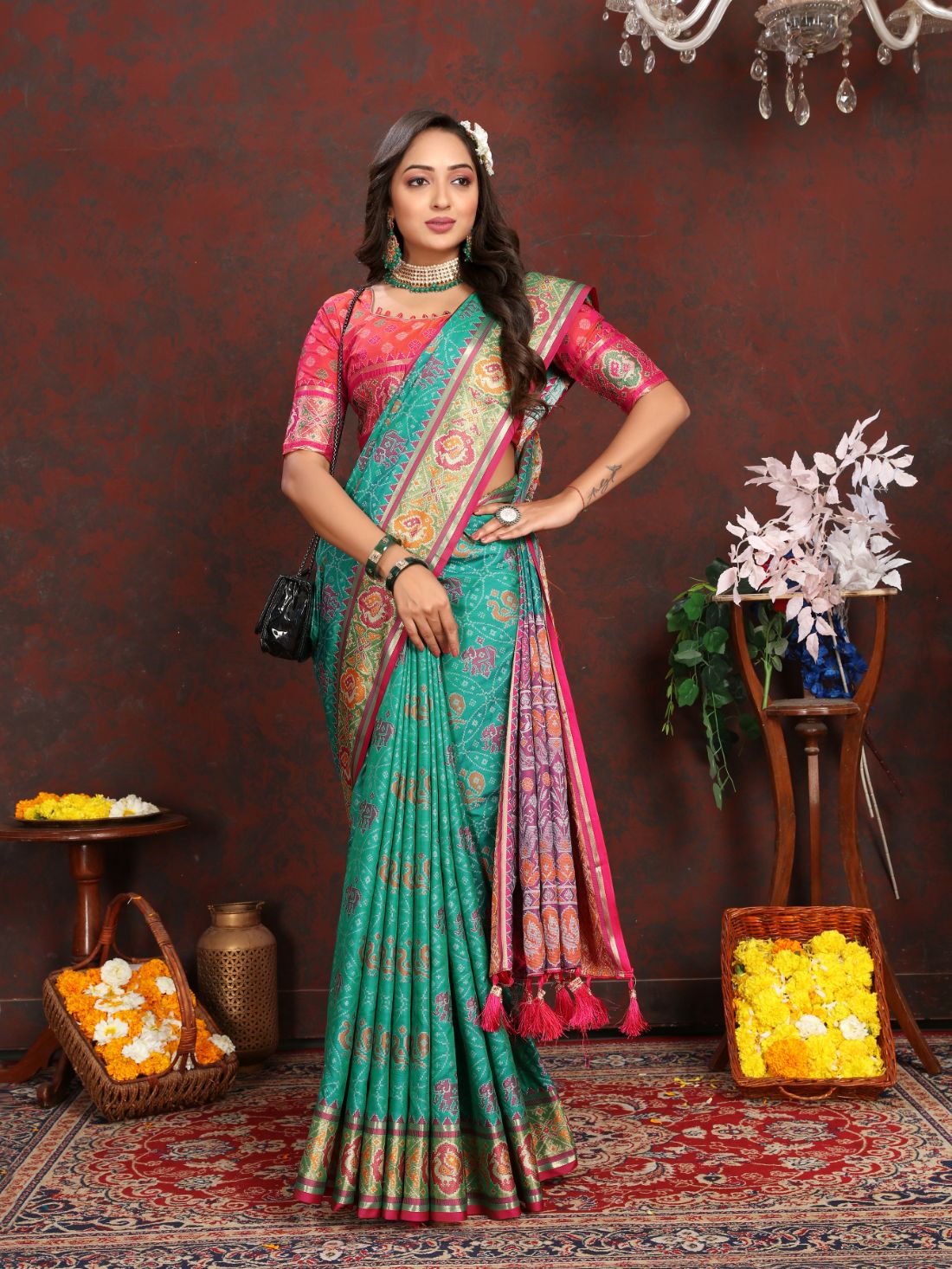 Aqua Blue & Pink Women's Soft Patola Silk meenakari weawing motifs with Rich Zari Pallu and contrast border with Tessels.