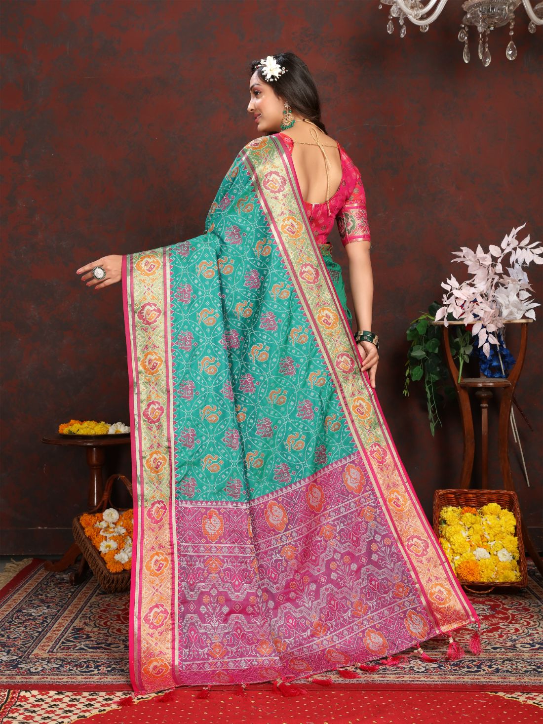 Aqua Blue & Pink Women's Soft Patola Silk meenakari weawing motifs with Rich Zari Pallu and contrast border with Tessels.