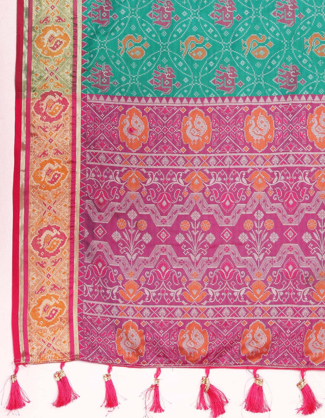 Aqua Blue & Pink Women's Soft Patola Silk meenakari weawing motifs with Rich Zari Pallu and contrast border with Tessels.