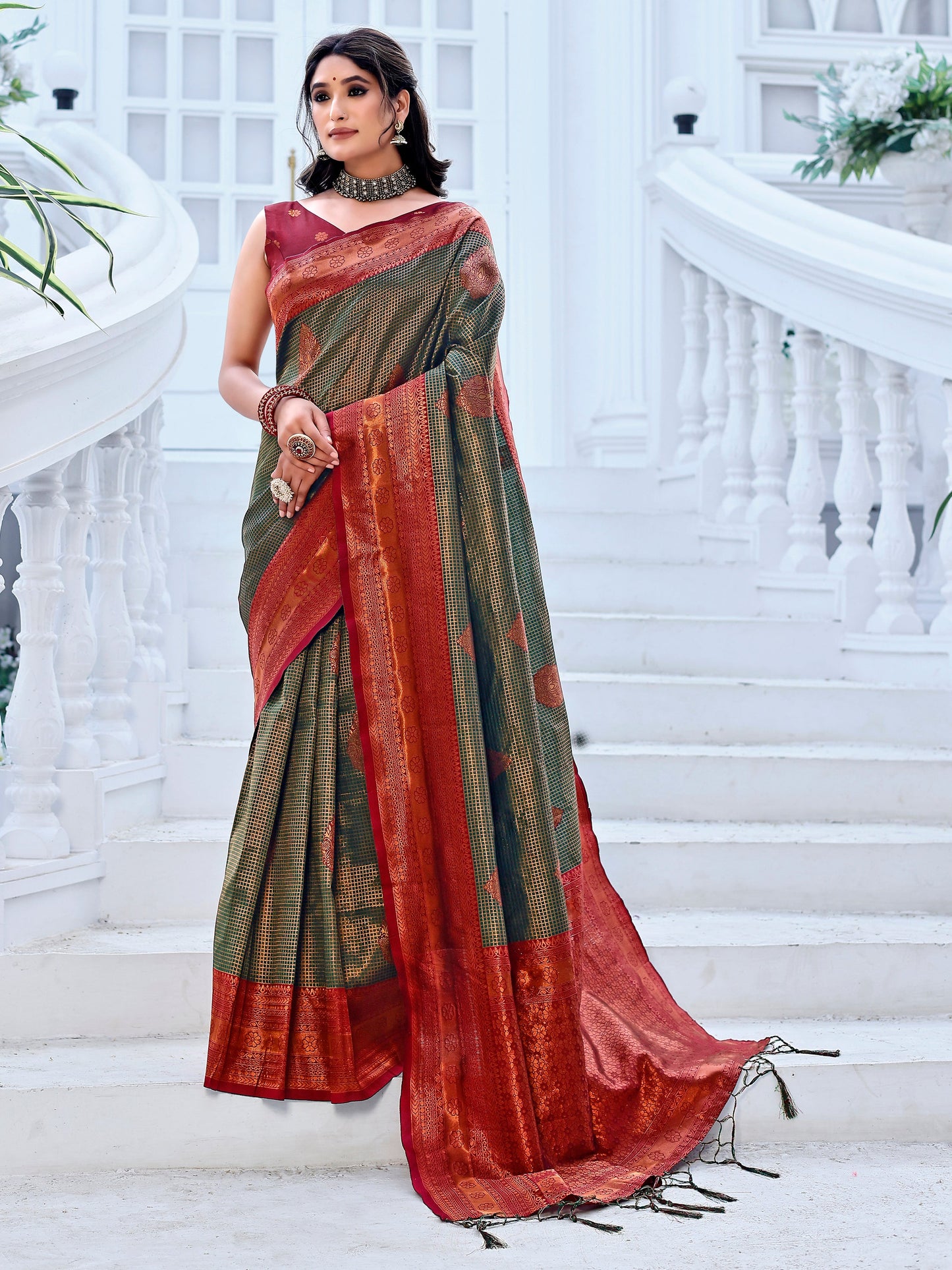 Regality Hunter Green and Coral Silk Saree with Intricate Zari Work