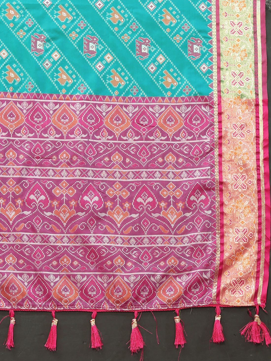 Light Blue & Purple Color Women's Soft Patola Silk meenakari weawing motifs with Rich Zari Pallu and contrast border with Tessels.